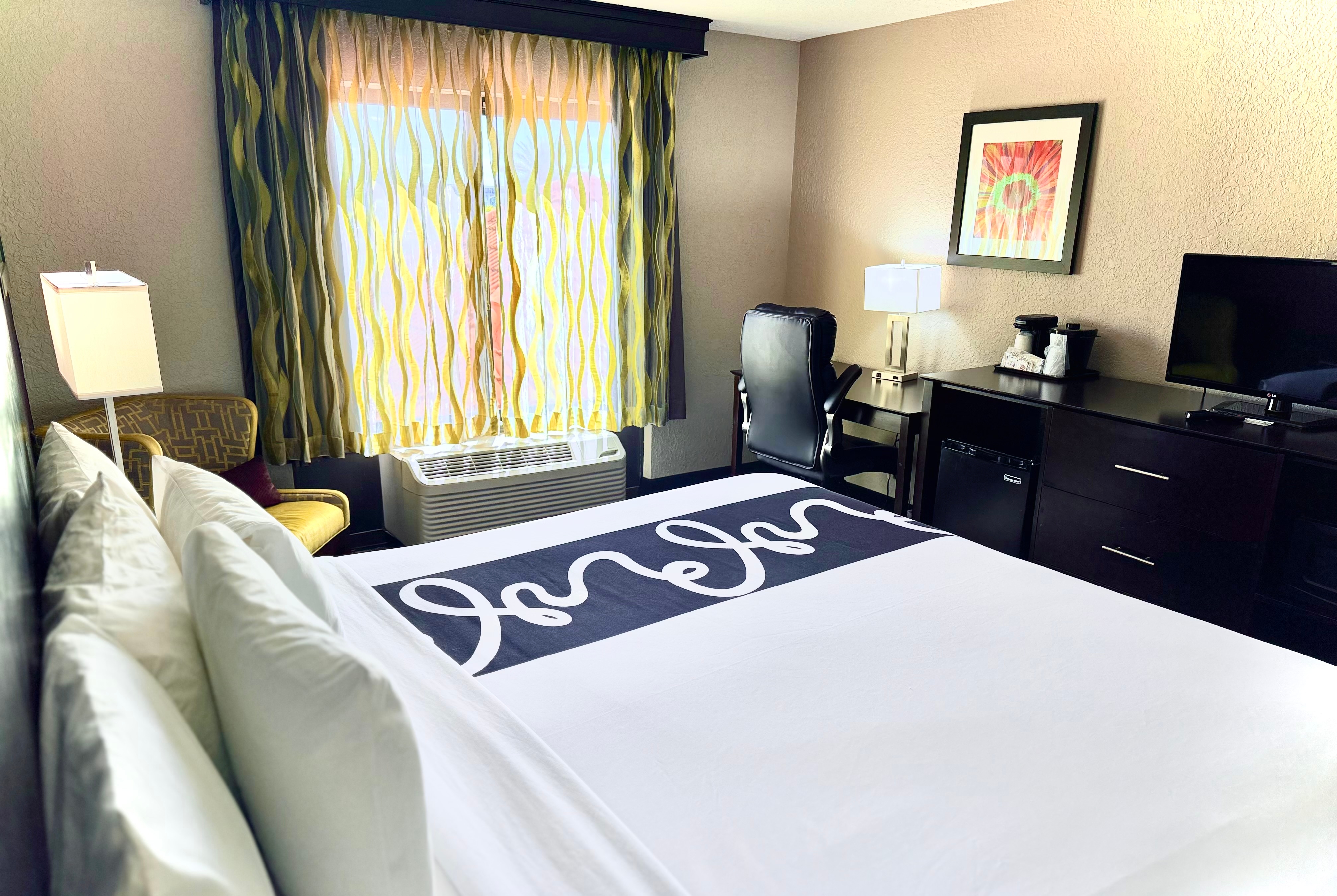 Guest room at the La Quinta Inn & Suites by Wyndham Orlando Universal area in Orlando, Florida