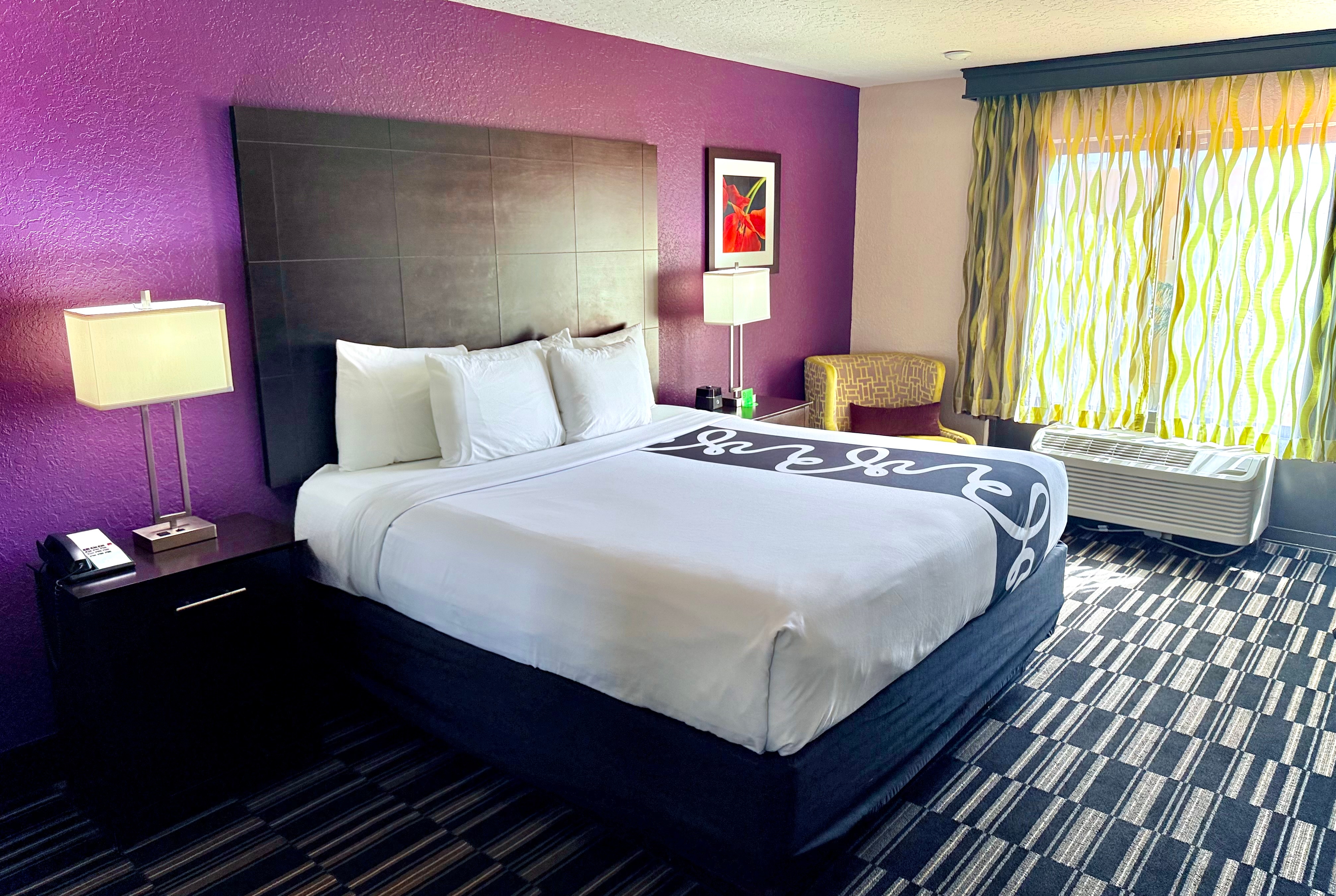 Guest room at the La Quinta Inn & Suites by Wyndham Orlando Universal area in Orlando, Florida