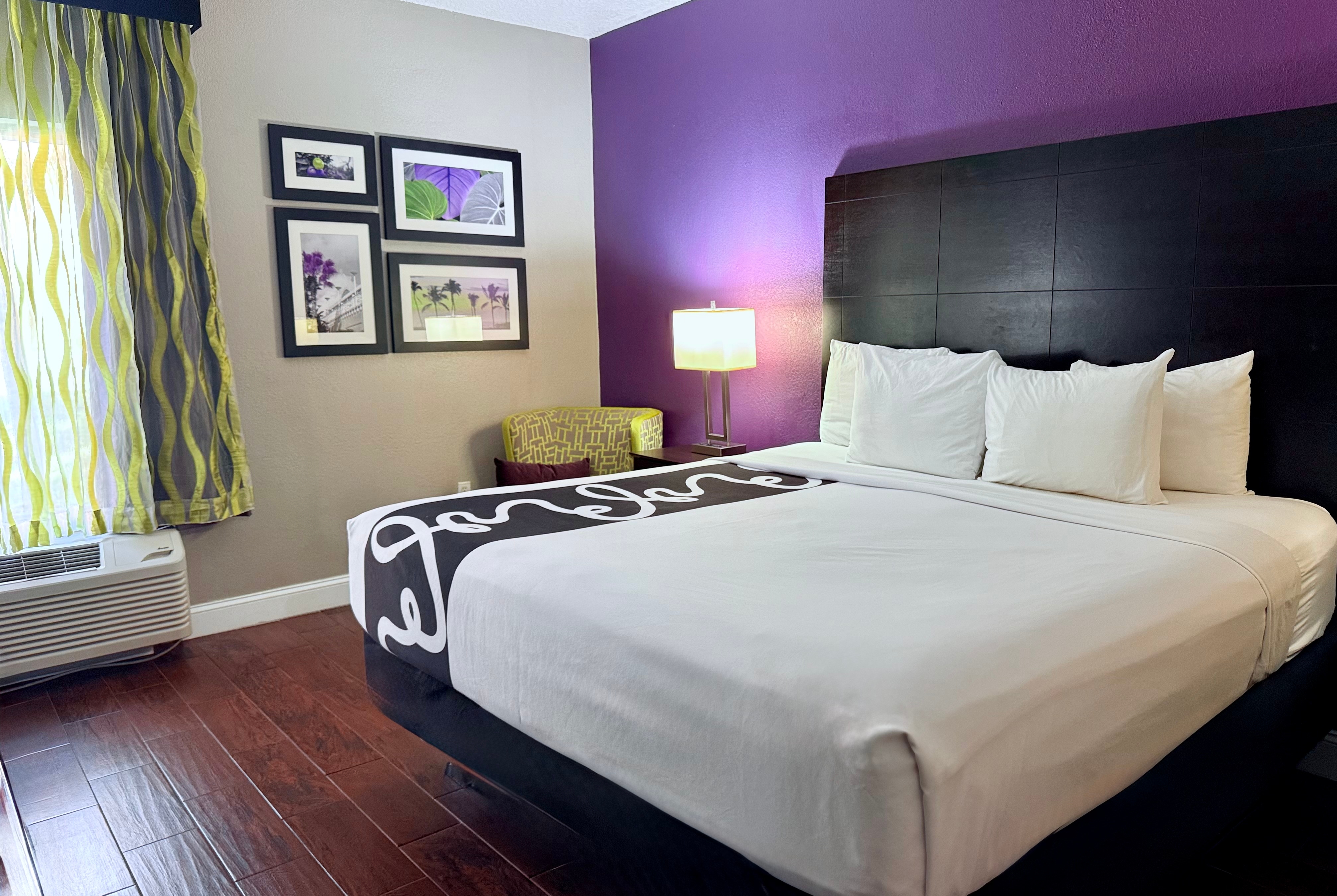 Guest room at the La Quinta Inn & Suites by Wyndham Orlando Universal area in Orlando, Florida