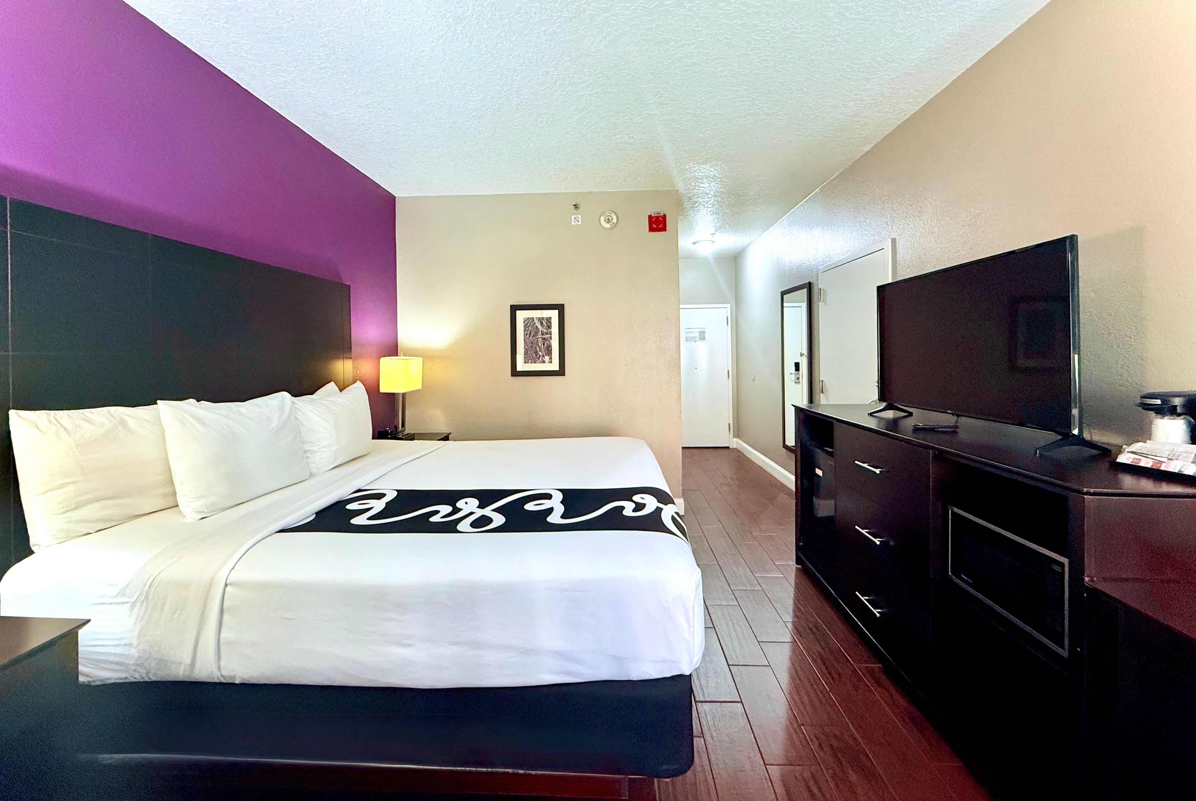 Guest room at the La Quinta Inn & Suites by Wyndham Orlando Universal area in Orlando, Florida