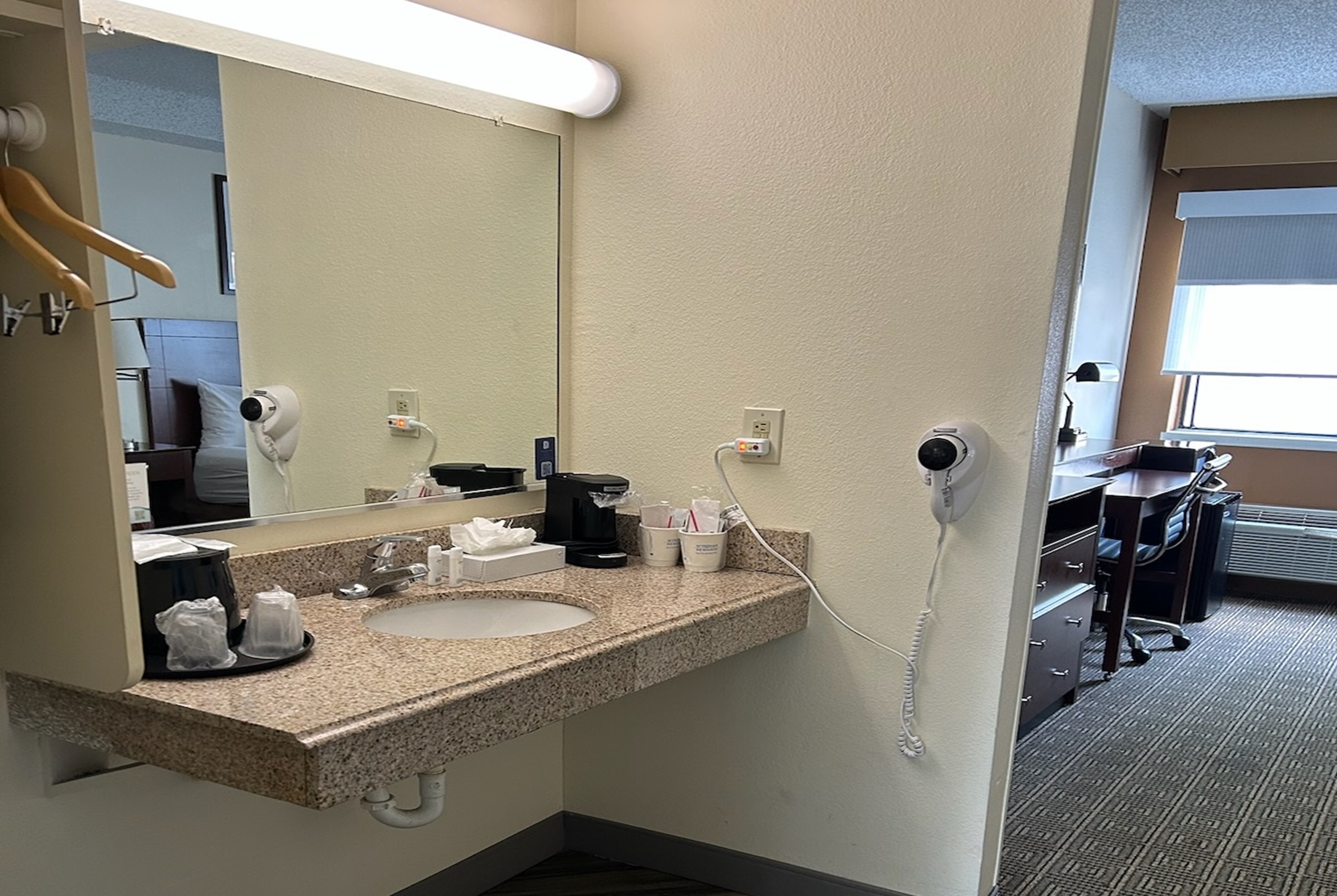 Guest room bath at the La Quinta Inn & Suites by Wyndham Orlando South in Orlando, Florida