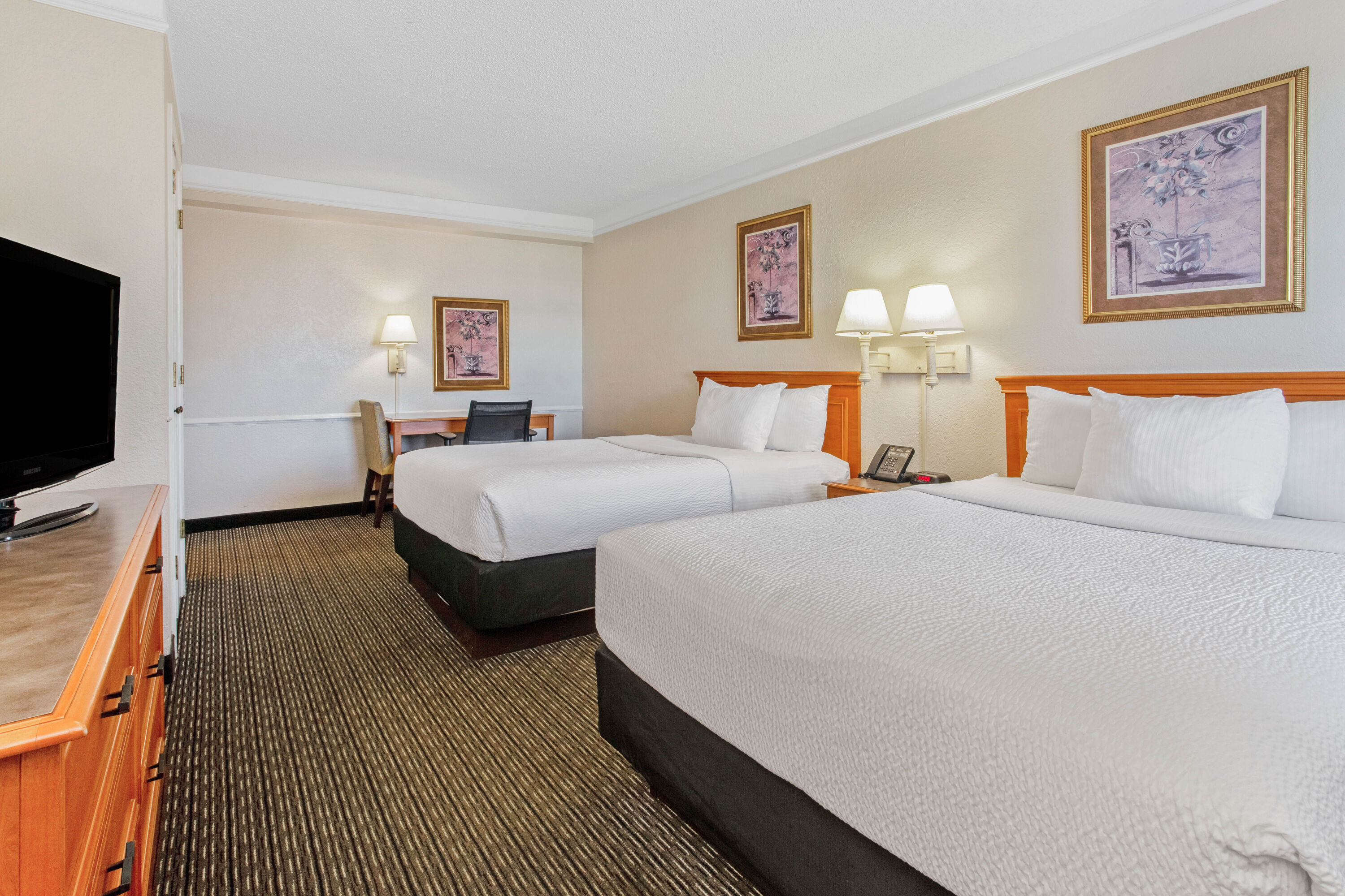 Guest room at the La Quinta Inn by Wyndham Tampa Bay Pinellas Park Clearwater in Pinellas Park, Florida