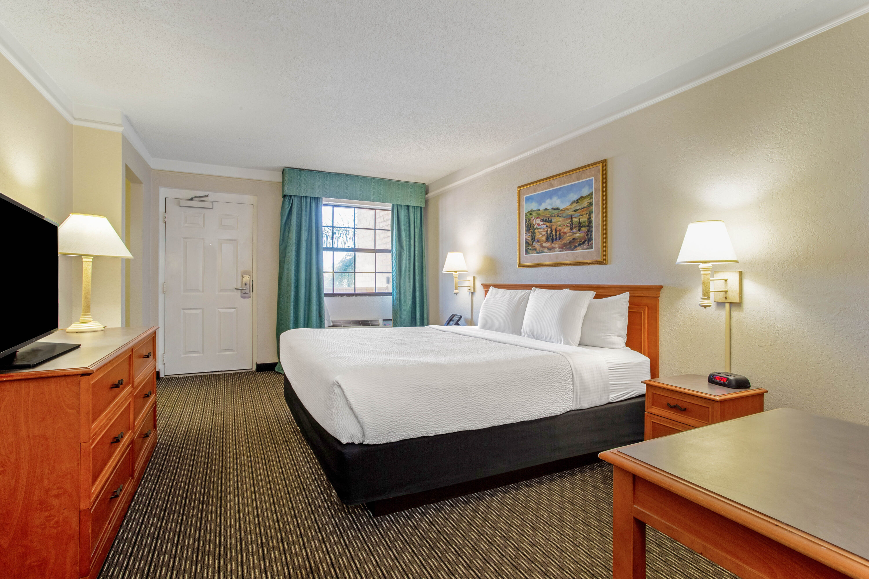 Guest room at the La Quinta Inn by Wyndham Tampa Bay Pinellas Park Clearwater in Pinellas Park, Florida