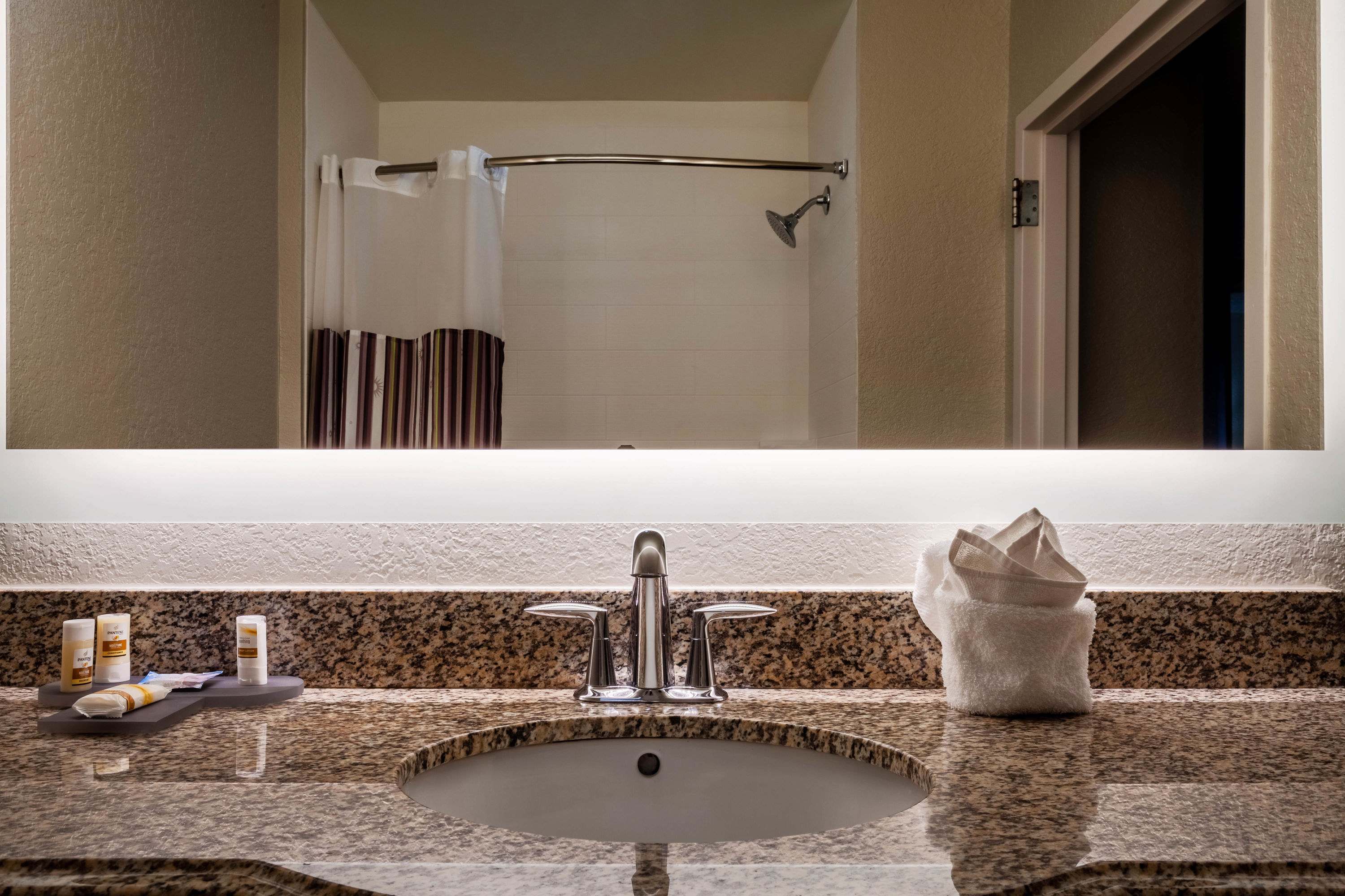 Guest room bath at the La Quinta Inn & Suites by Wyndham Port Orange / Daytona in Port Orange, Florida