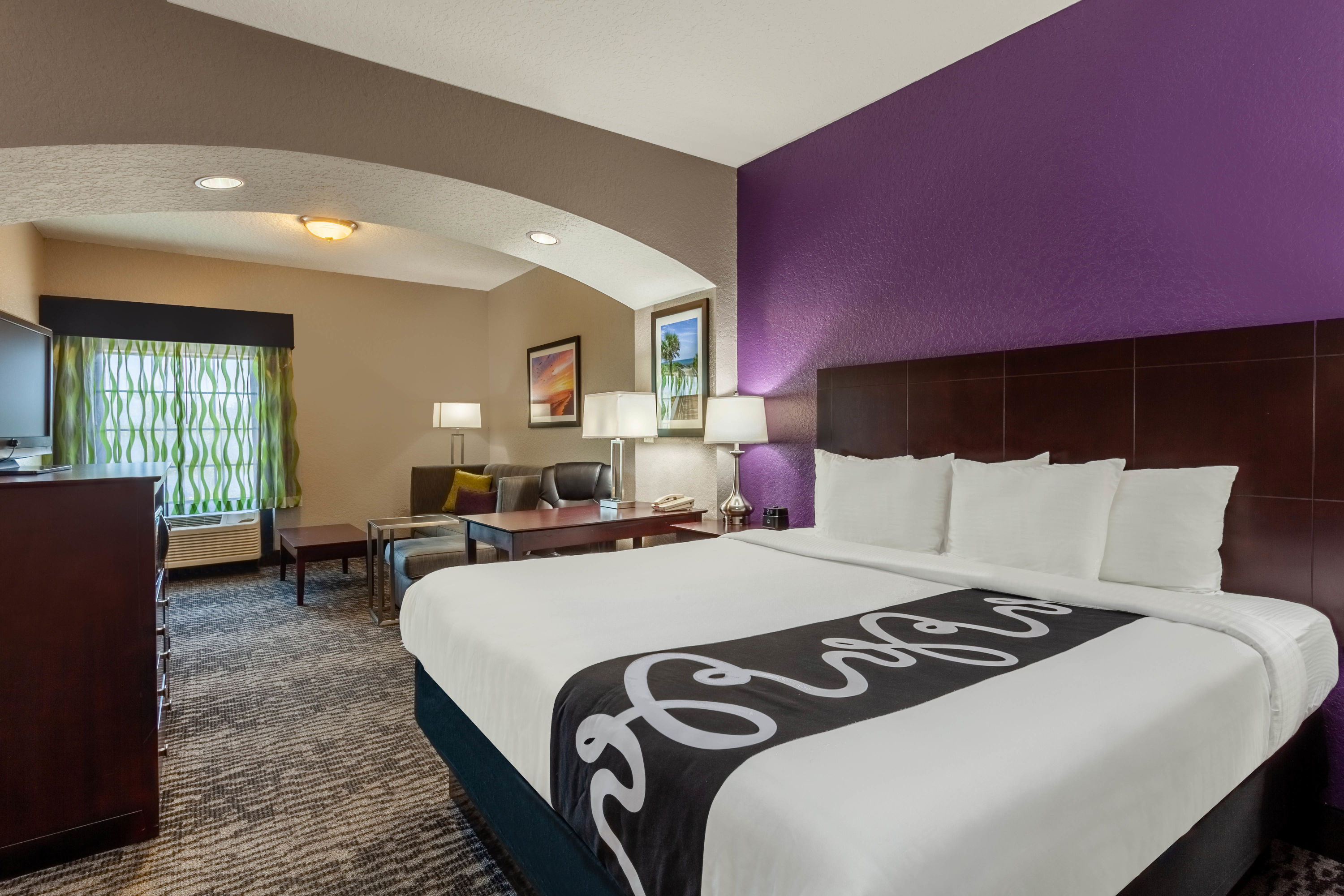 Guest room at the La Quinta Inn & Suites by Wyndham Port Orange / Daytona in Port Orange, Florida