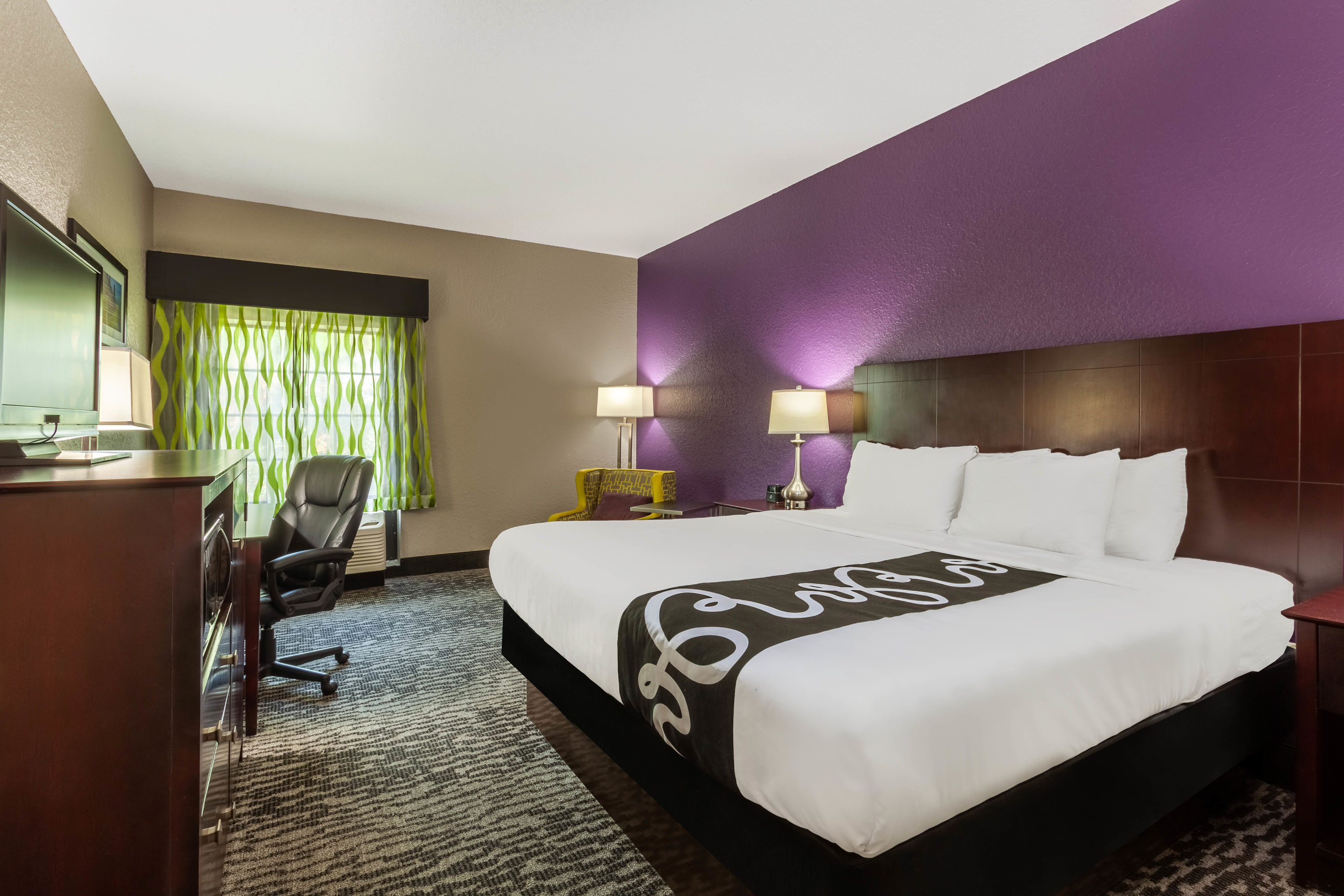 Guest room at the La Quinta Inn & Suites by Wyndham Port Orange / Daytona in Port Orange, Florida