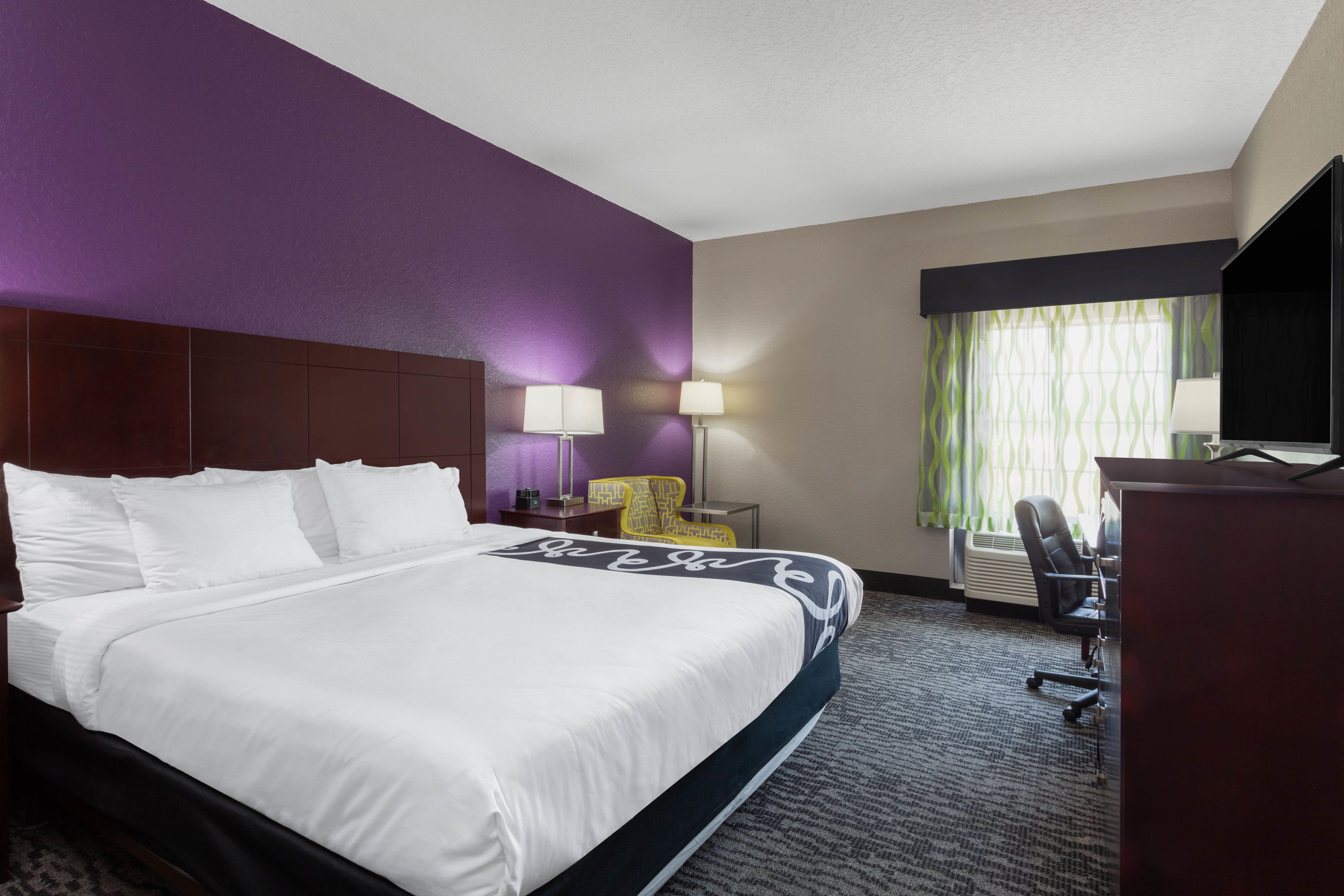 Guest room at the La Quinta Inn & Suites by Wyndham Port Orange / Daytona in Port Orange, Florida