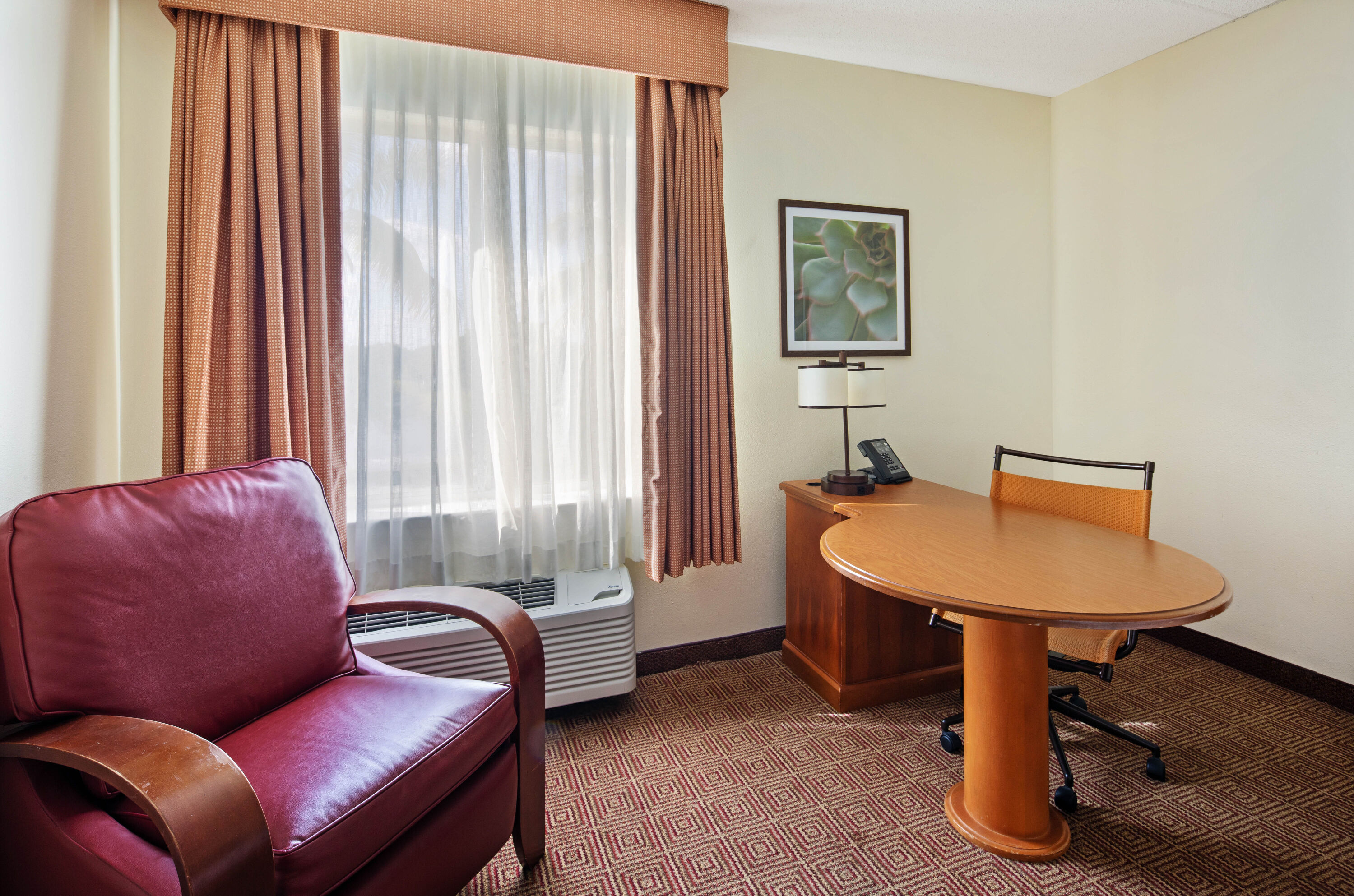 Guest room at the La Quinta Inn & Suites by Wyndham Sawgrass in Sunrise, Florida