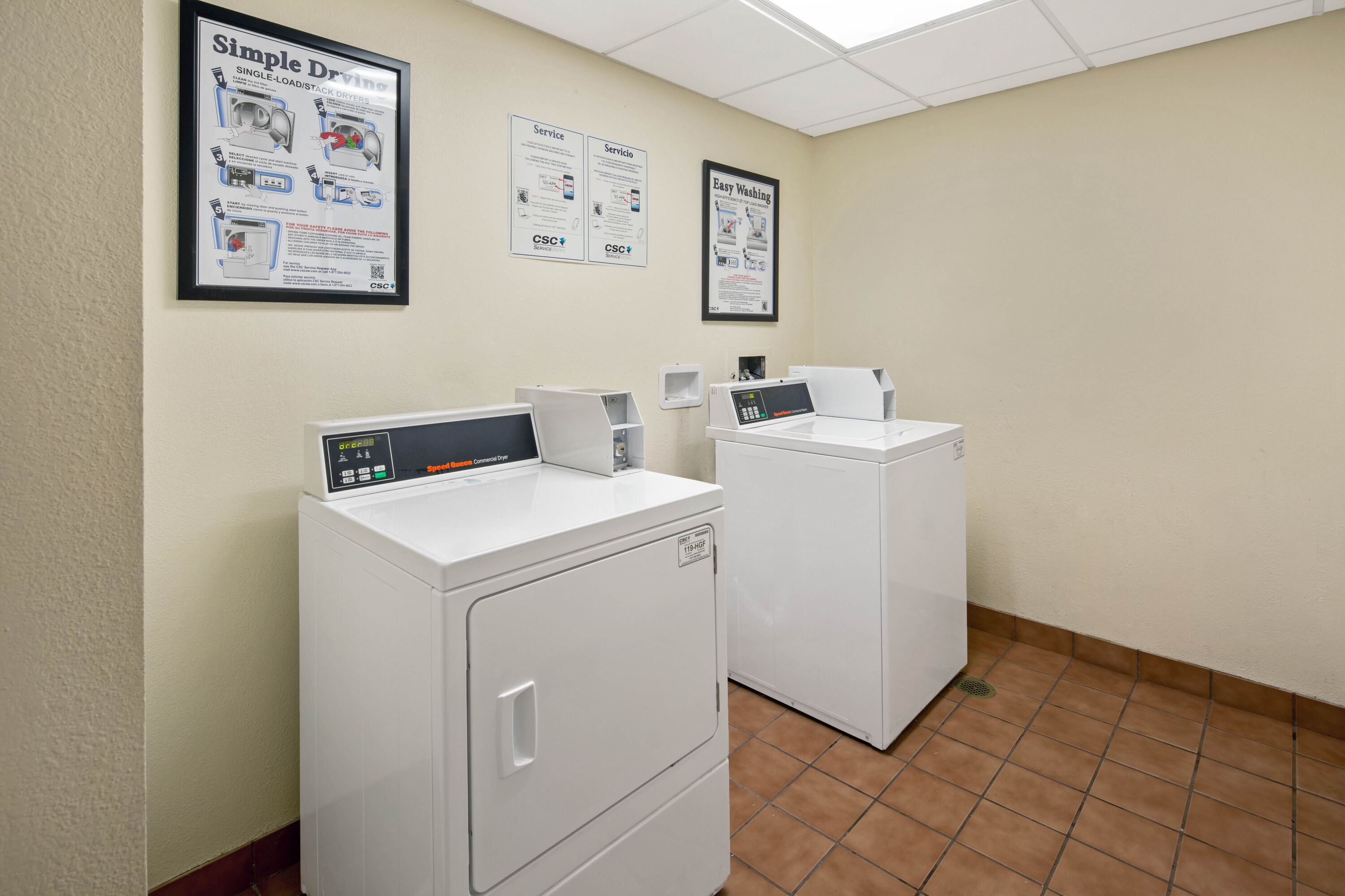 Laundry facilities at La Quinta Inn & Suites by Wyndham Sawgrass in Sunrise, Florida