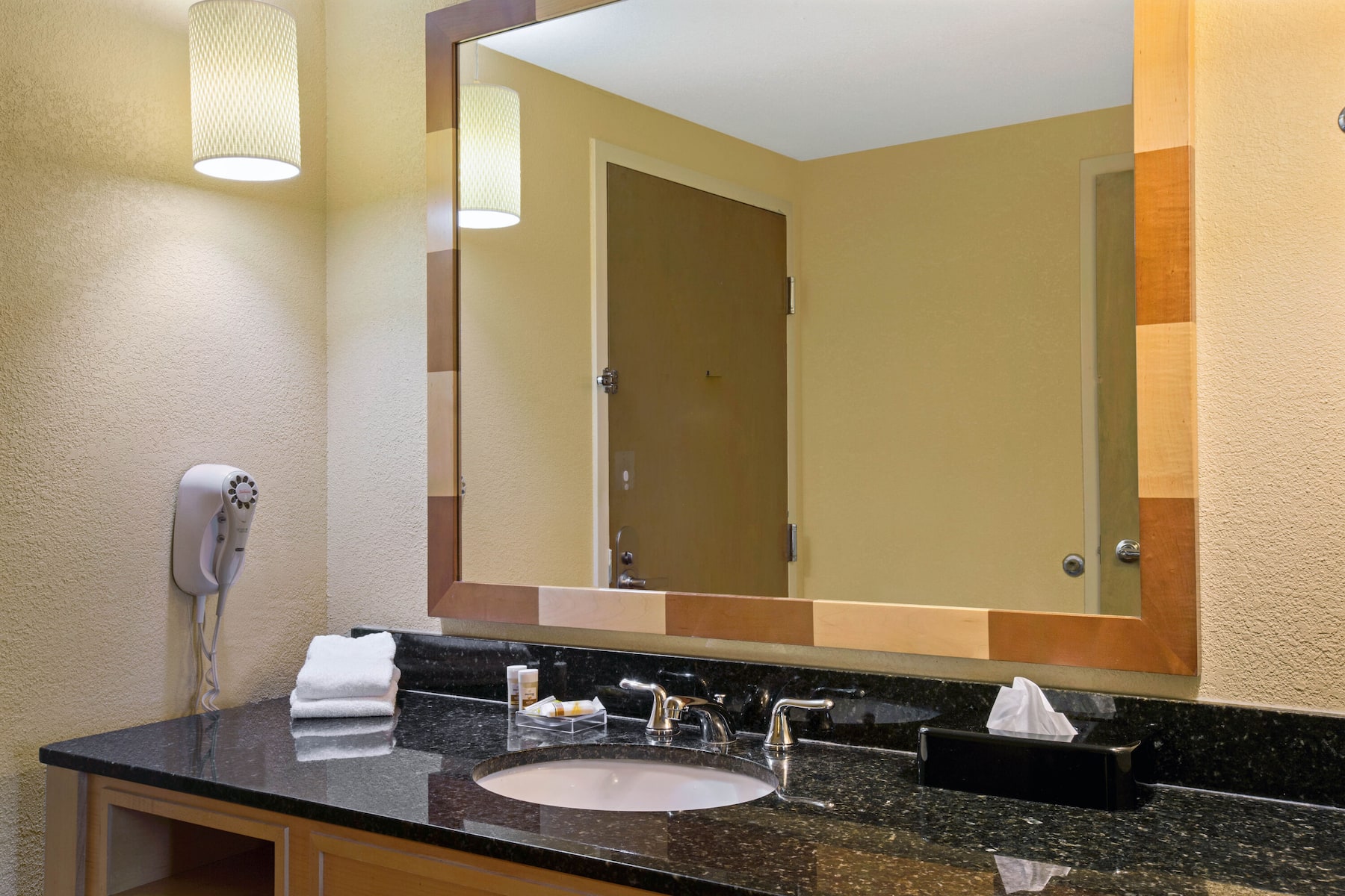 Guest room bath at the La Quinta Inn & Suites by Wyndham Sunrise in Sunrise, Florida