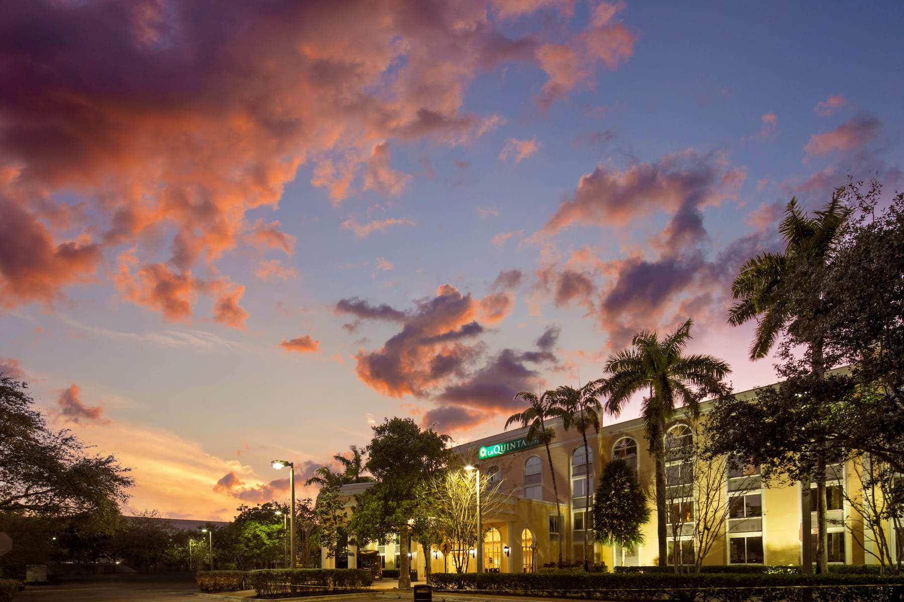 Exterior Night Image of La Quinta Inn & Suites by Wyndham Sunrise hotel in Sunrise, Florida