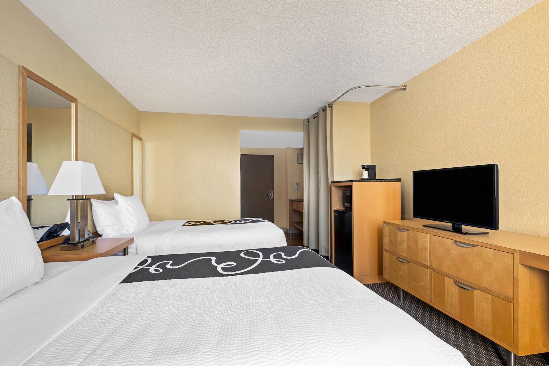 Guest room at the La Quinta Inn & Suites by Wyndham Sunrise in Sunrise, Florida