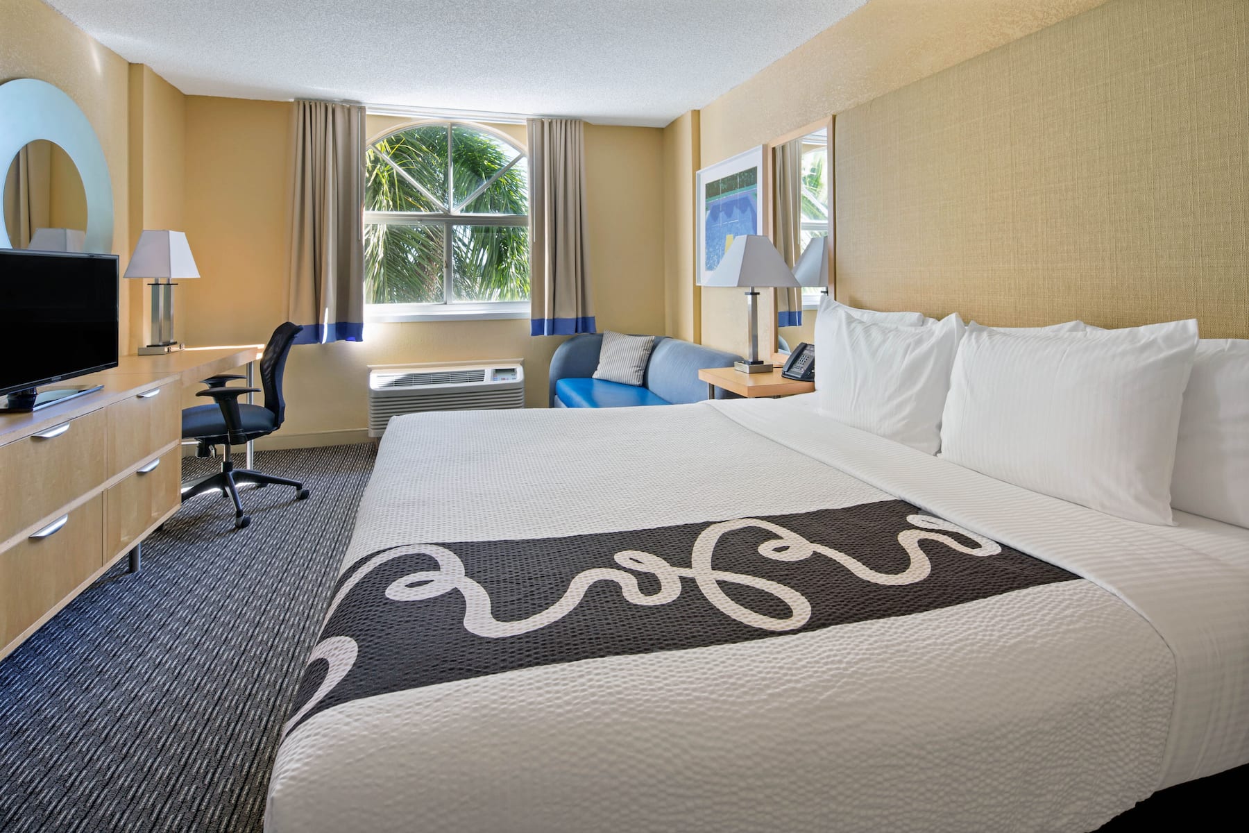 Guest room at the La Quinta Inn & Suites by Wyndham Sunrise in Sunrise, Florida