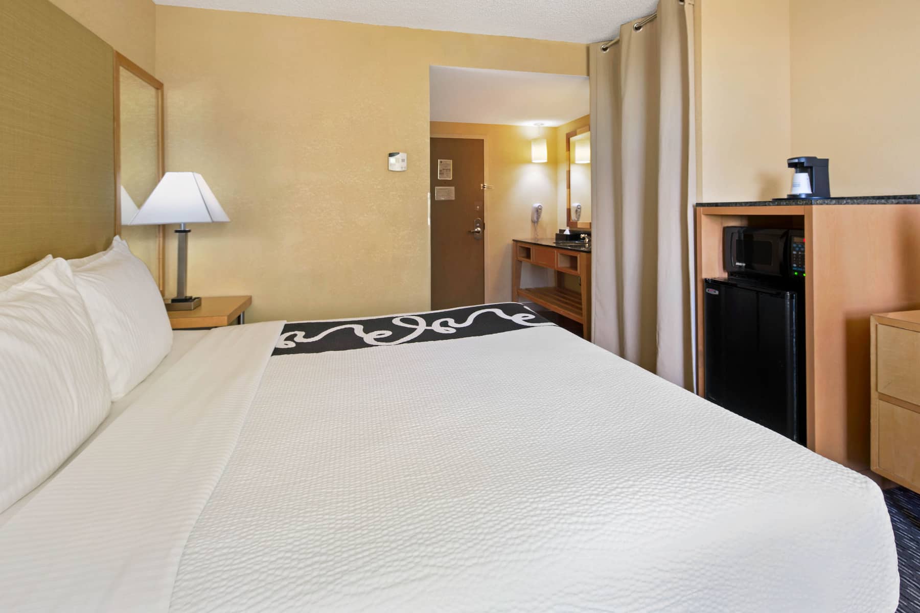 Guest room at the La Quinta Inn & Suites by Wyndham Sunrise in Sunrise, Florida