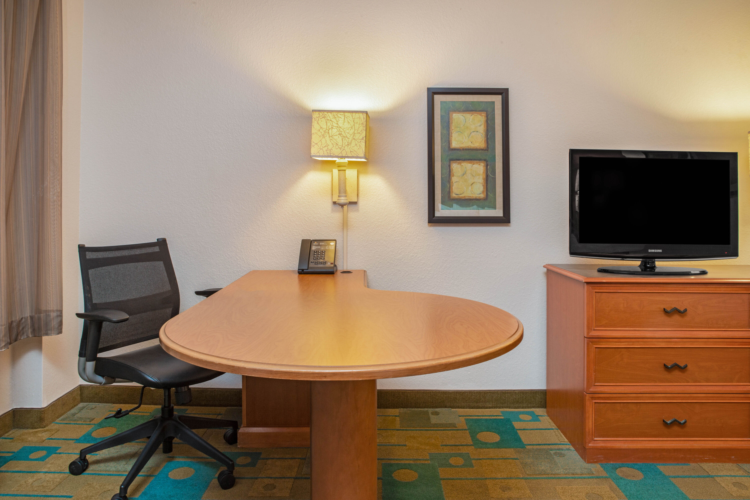 Guest room feature at the La Quinta Inn & Suites by Wyndham USF (Near Busch Gardens) in Tampa, Florida