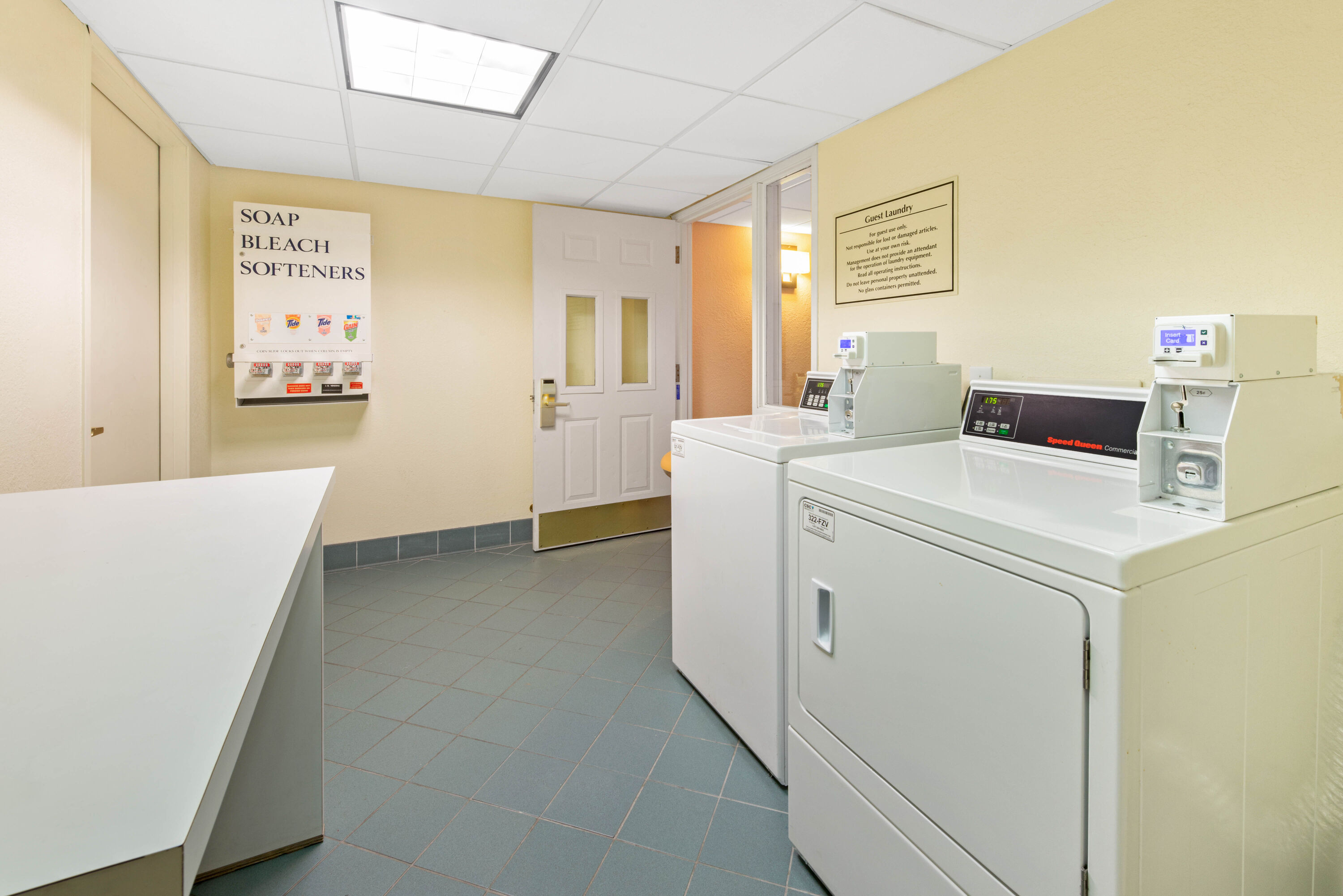 Laundry facilities at La Quinta Inn & Suites by Wyndham USF (Near Busch Gardens) in Tampa, Florida