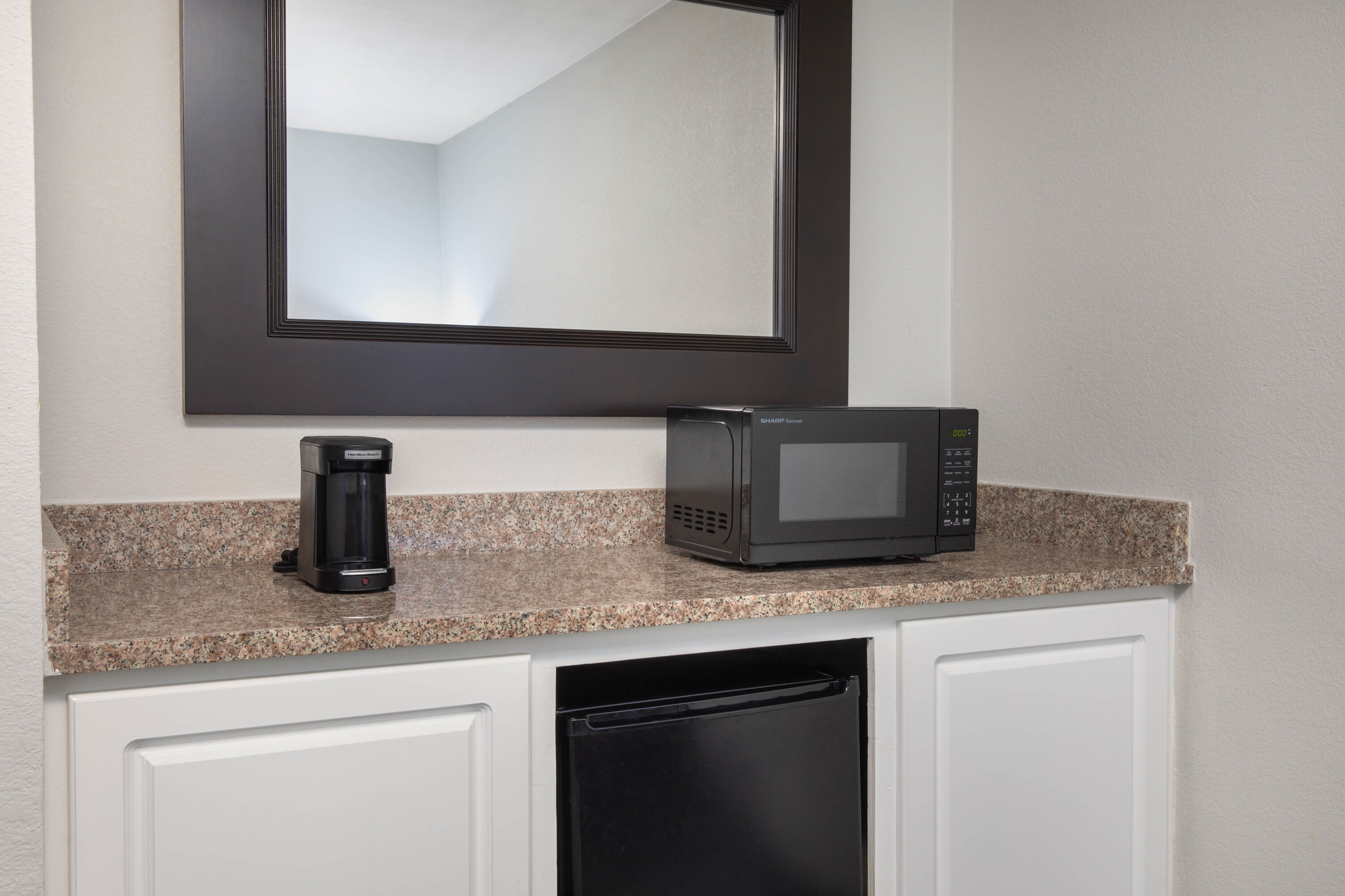 Guest room feature at the La Quinta Inn & Suites by Wyndham Atlanta Airport South in Atlanta, Georgia