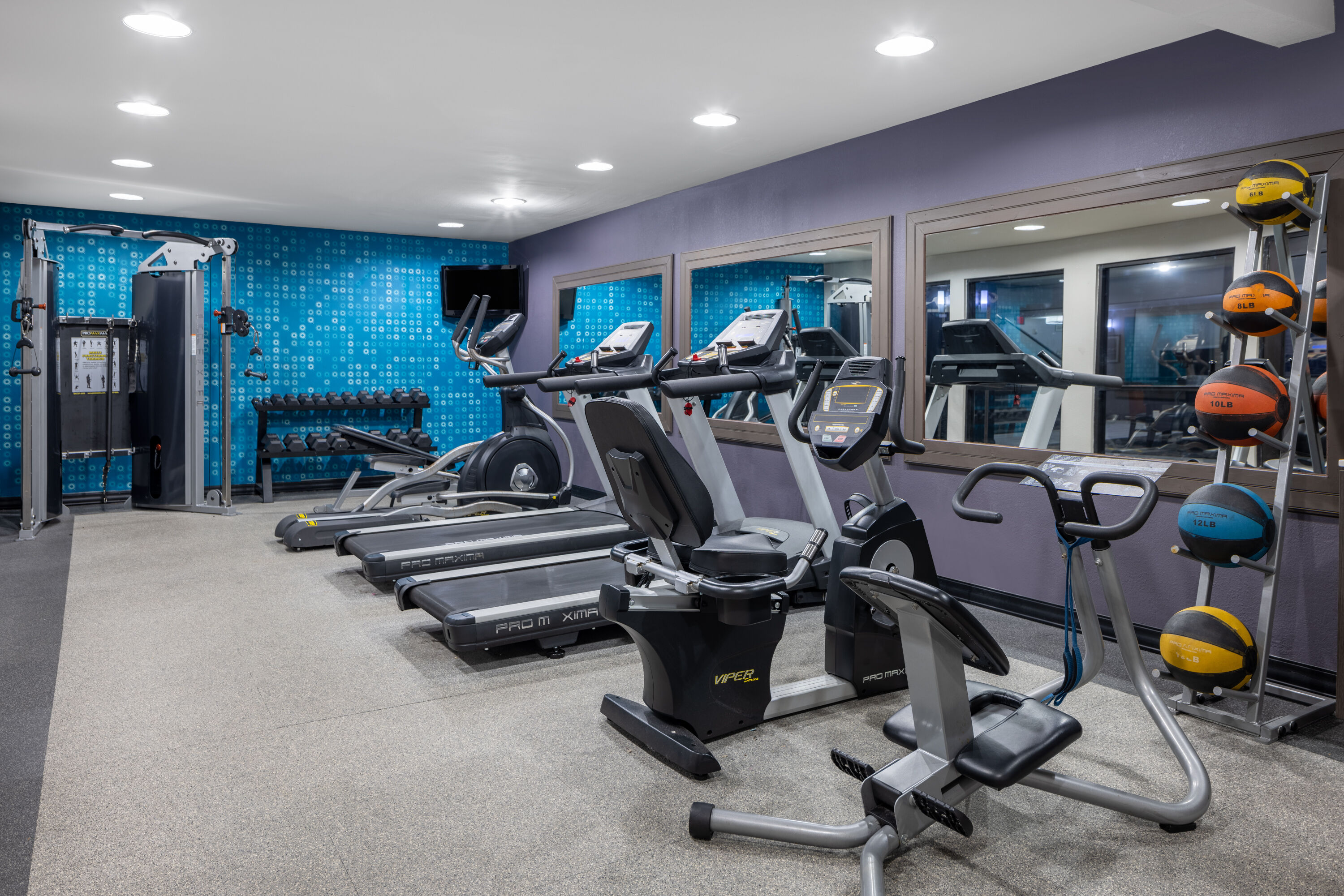 Fitness room at La Quinta Inn & Suites by Wyndham Covington in Covington, Georgia