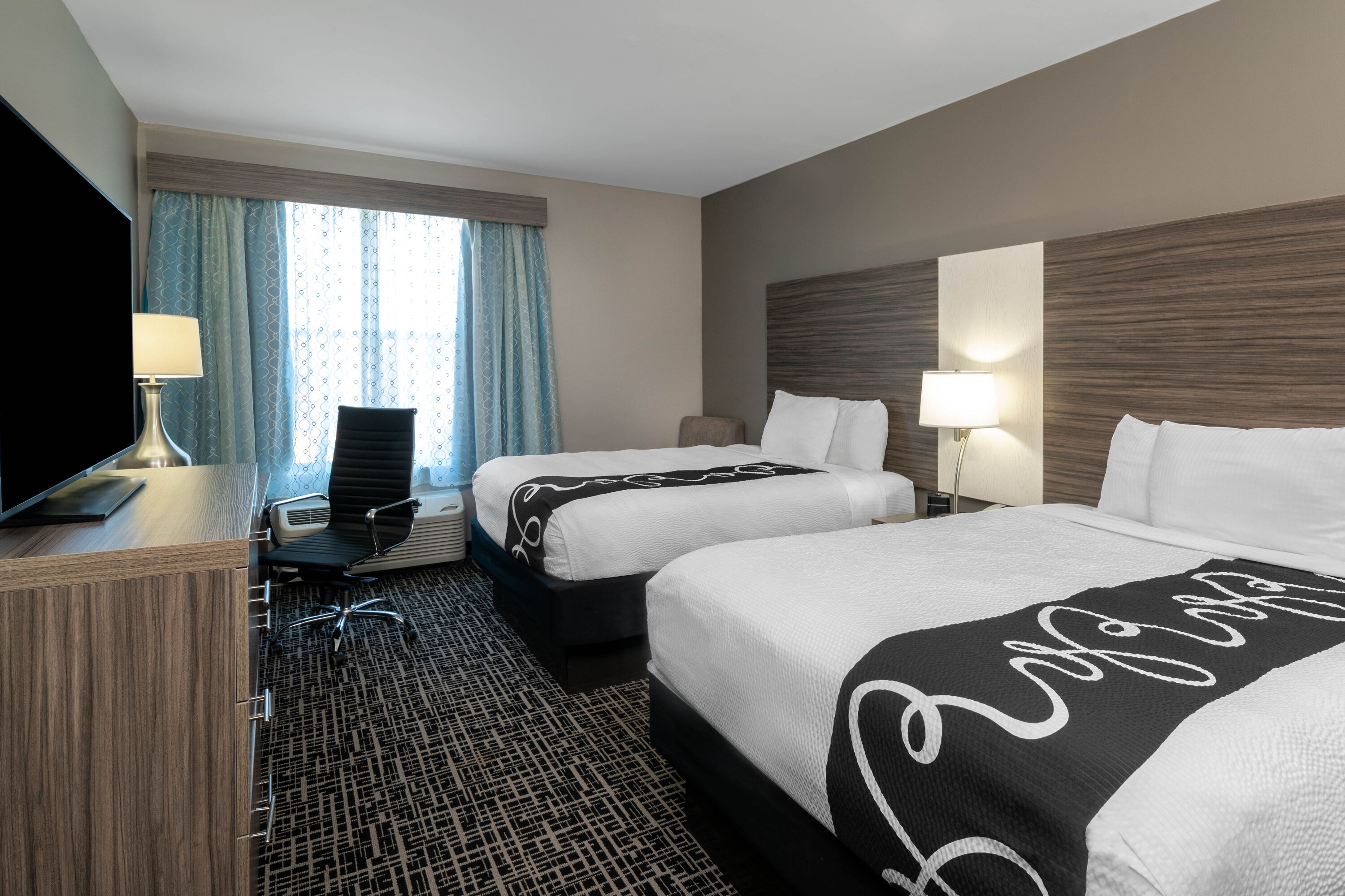 Guest room at the La Quinta Inn & Suites by Wyndham Forsyth in Forsyth, Georgia