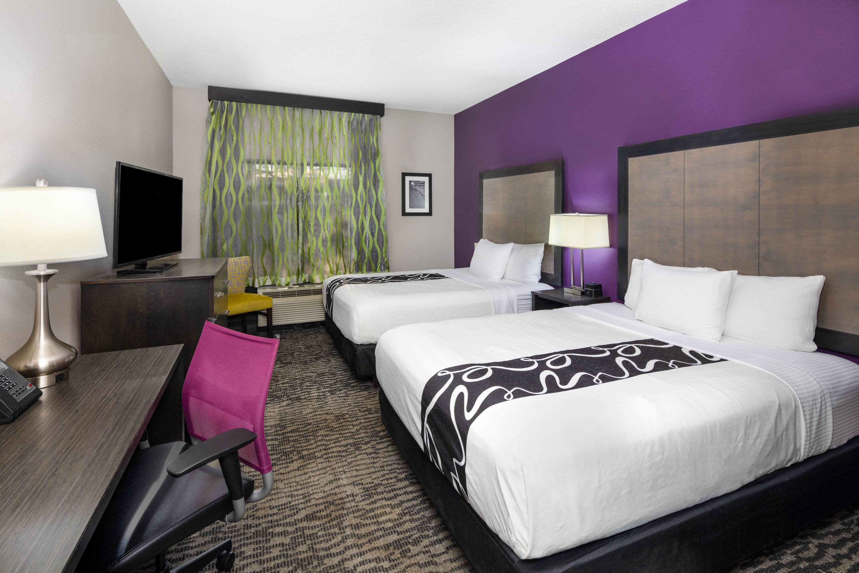 Guest room at the La Quinta Inn & Suites by Wyndham Kennesaw in Kennesaw, Georgia