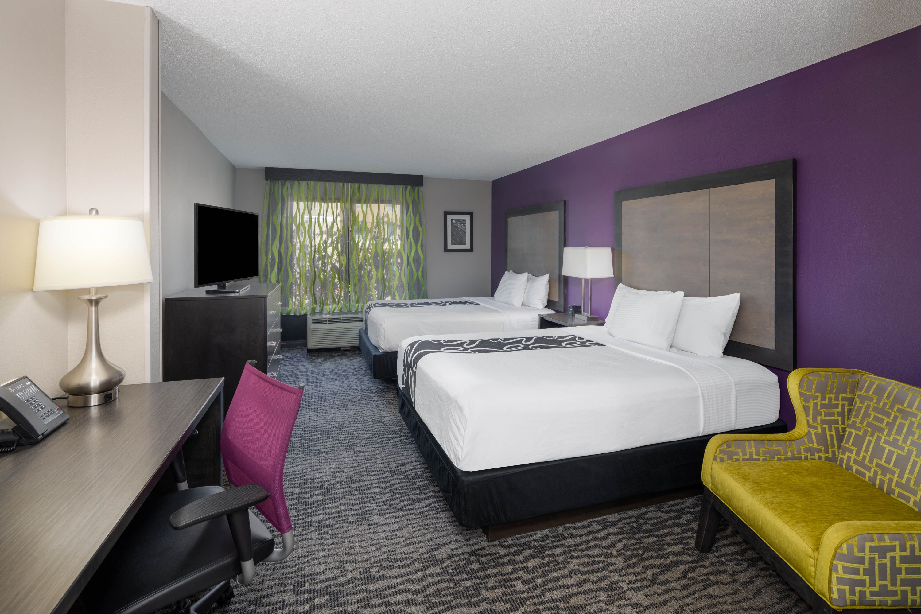 Guest room at the La Quinta Inn & Suites by Wyndham Kennesaw in Kennesaw, Georgia