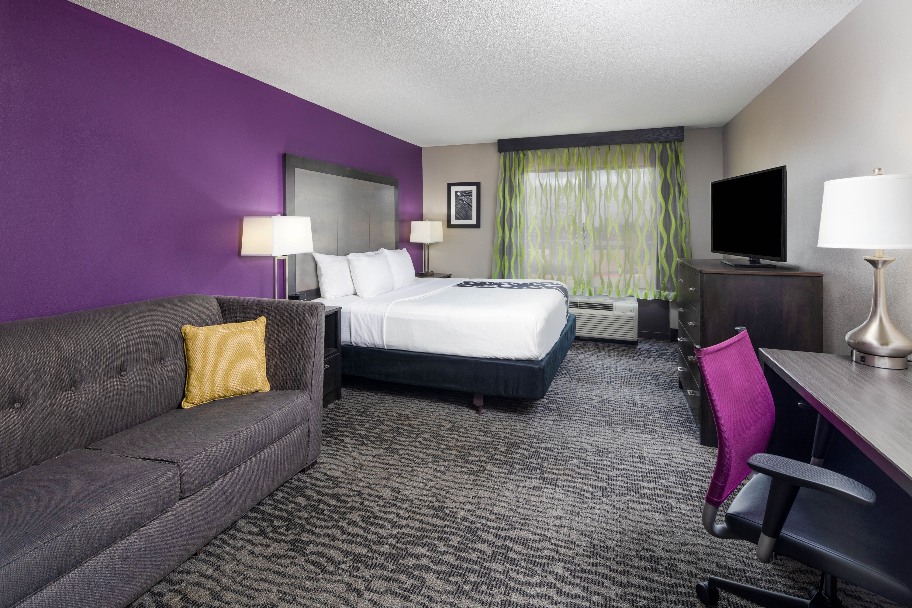 Guest room at the La Quinta Inn & Suites by Wyndham Kennesaw in Kennesaw, Georgia