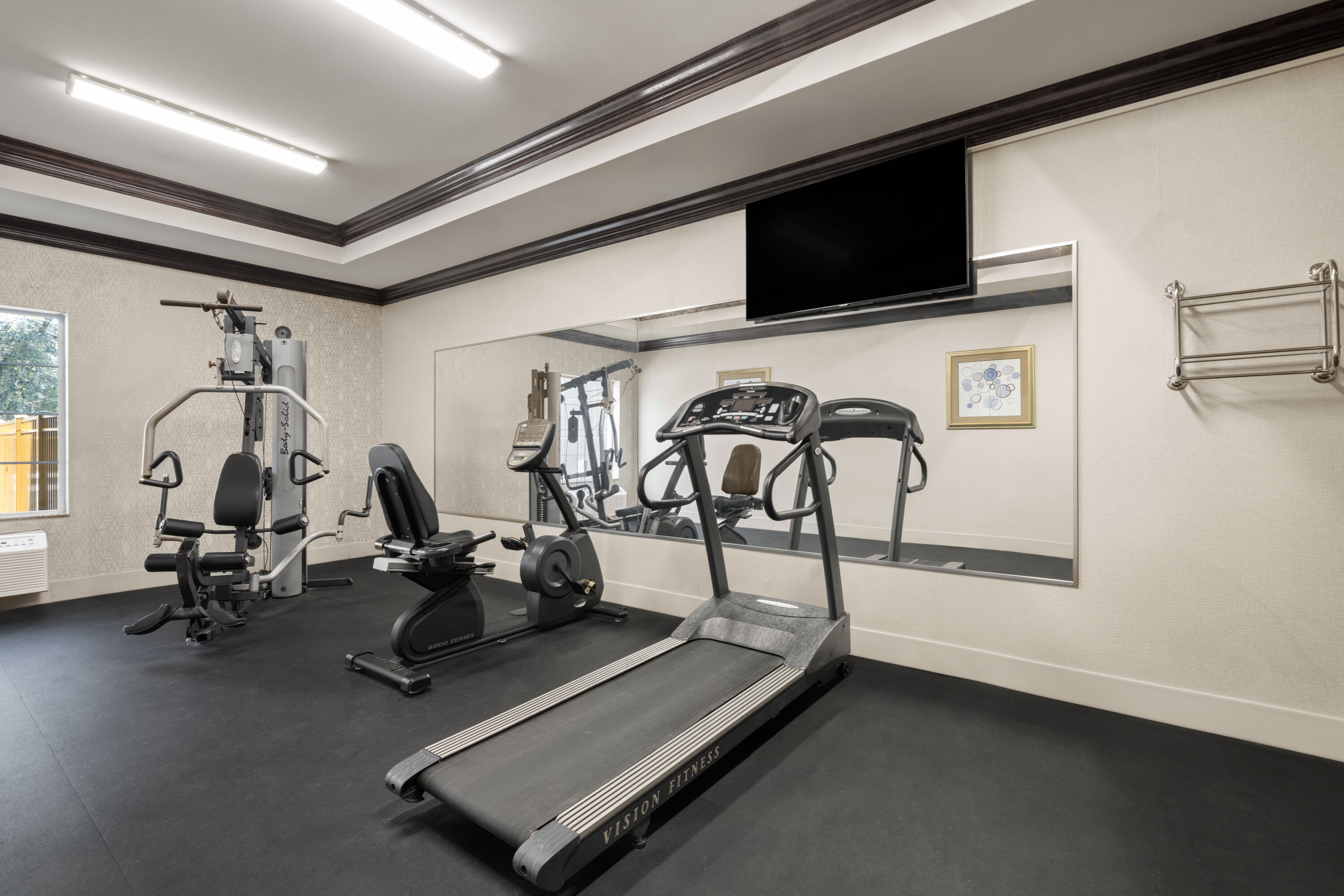 Fitness room at La Quinta Inn & Suites by Wyndham Savannah Airport - Pooler in Pooler, Georgia