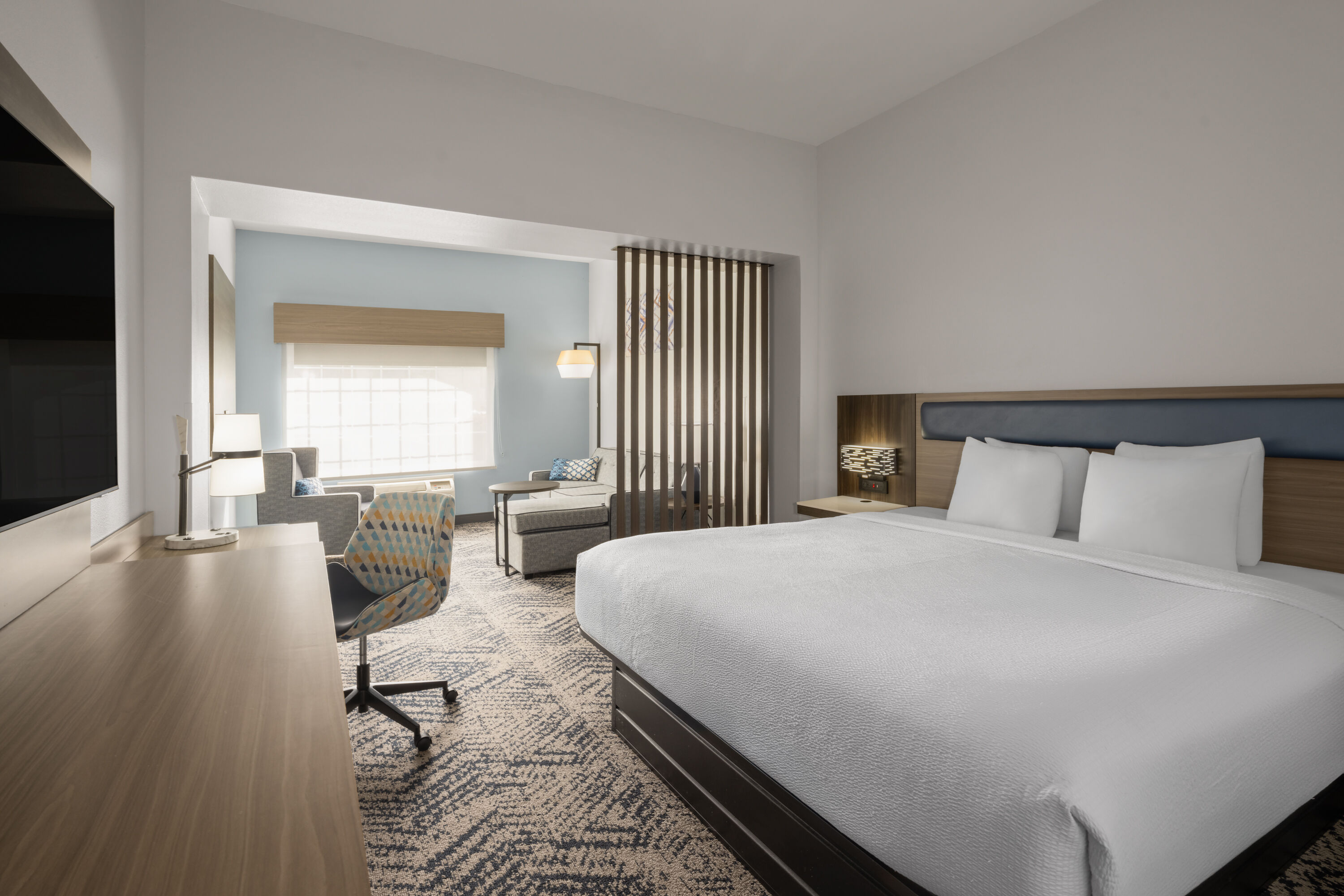 Guest room at the La Quinta Inn & Suites by Wyndham Savannah Airport - Pooler in Pooler, Georgia