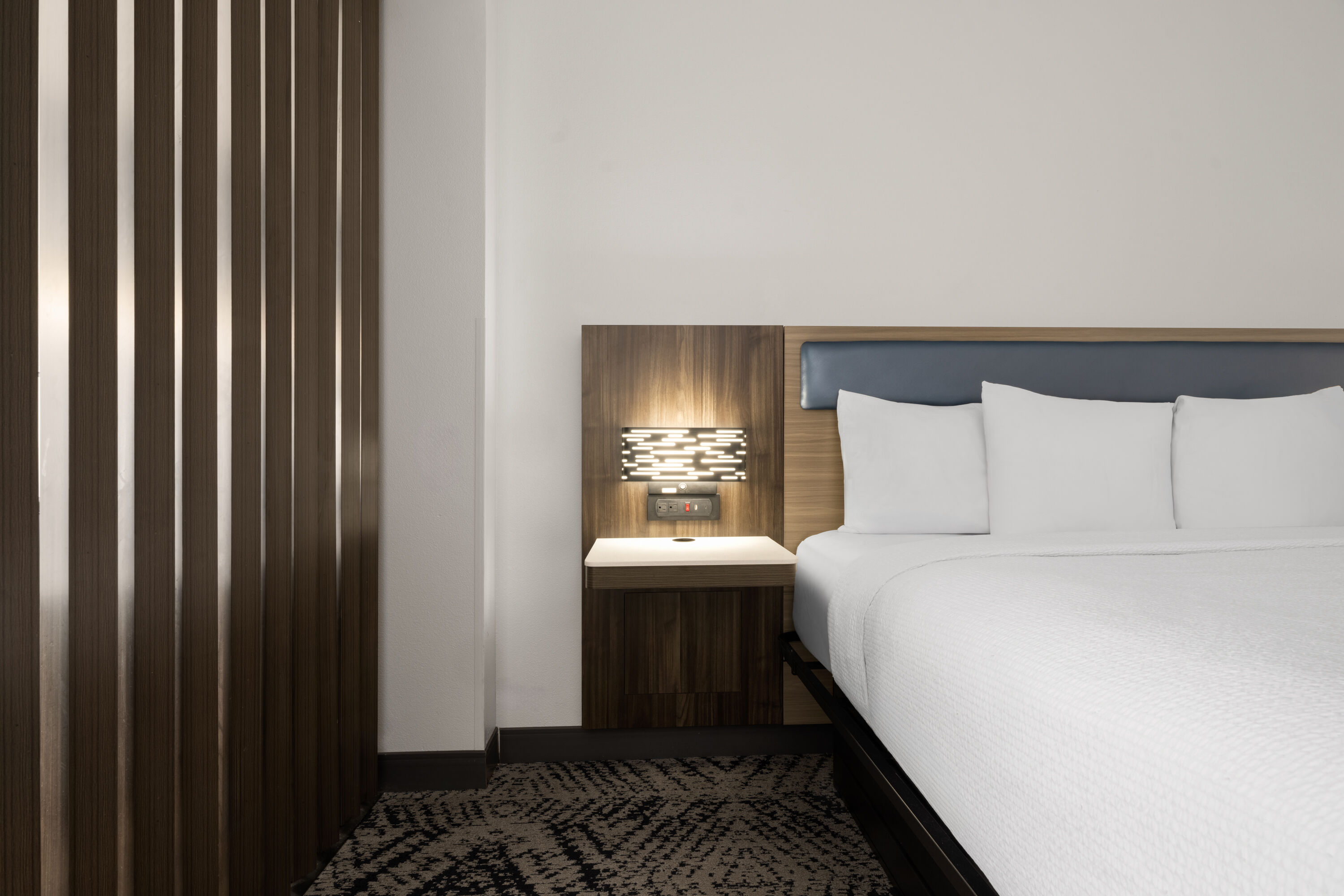 Guest room at the La Quinta Inn & Suites by Wyndham Savannah Airport - Pooler in Pooler, Georgia