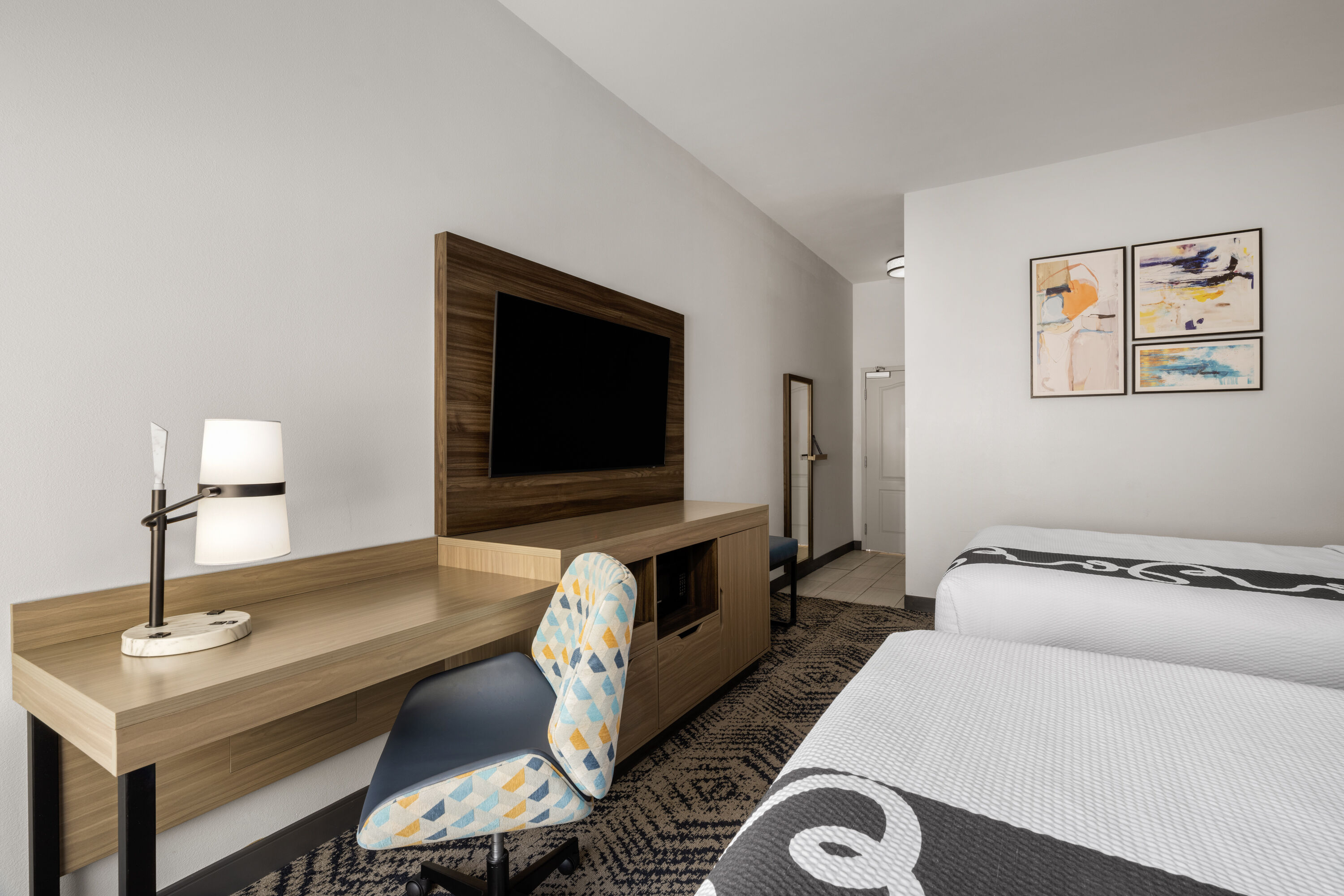 Guest room at the La Quinta Inn & Suites by Wyndham Savannah Airport - Pooler in Pooler, Georgia