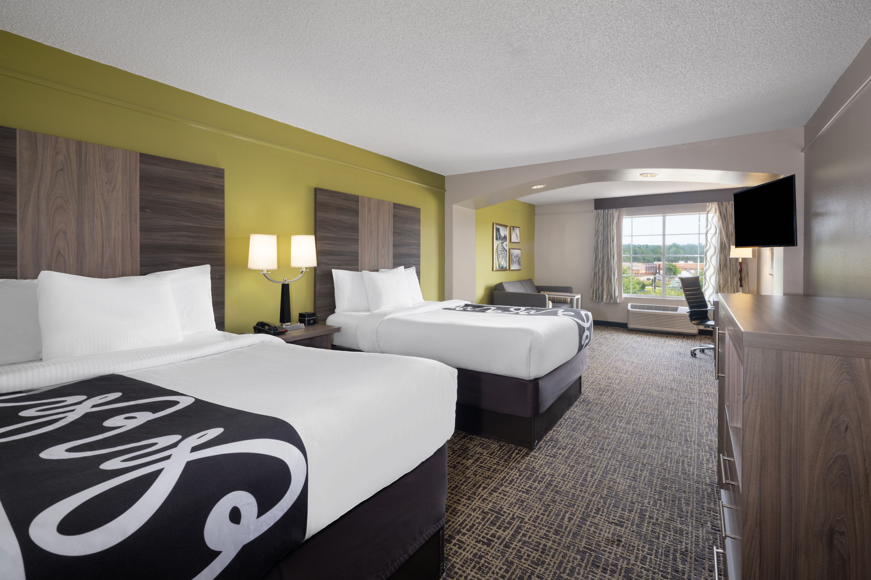Guest room at the La Quinta Inn & Suites by Wyndham Atlanta Stockbridge in Stockbridge, Georgia