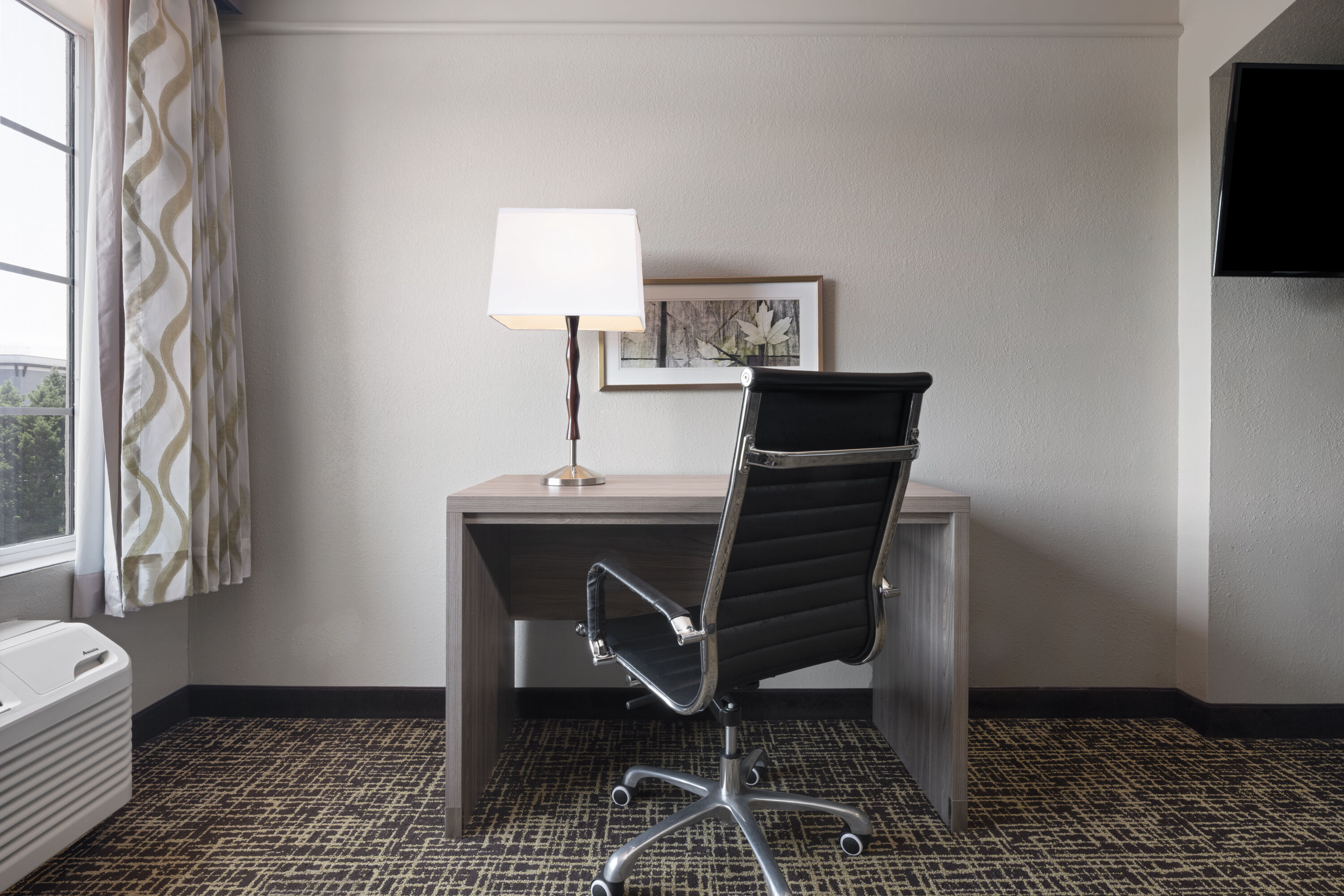 Guest room at the La Quinta Inn & Suites by Wyndham Atlanta Stockbridge in Stockbridge, Georgia