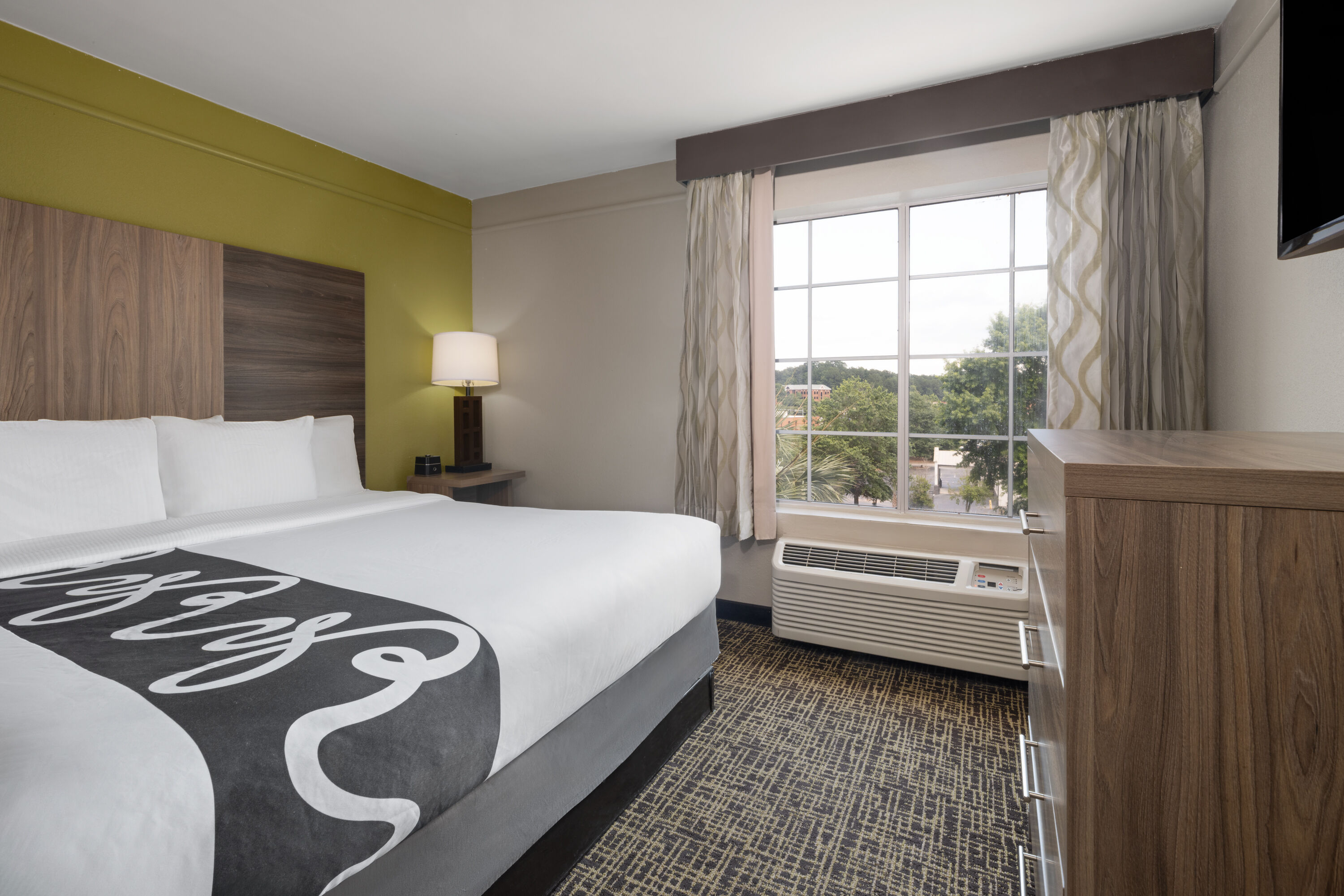 Guest room at the La Quinta Inn & Suites by Wyndham Atlanta Stockbridge in Stockbridge, Georgia