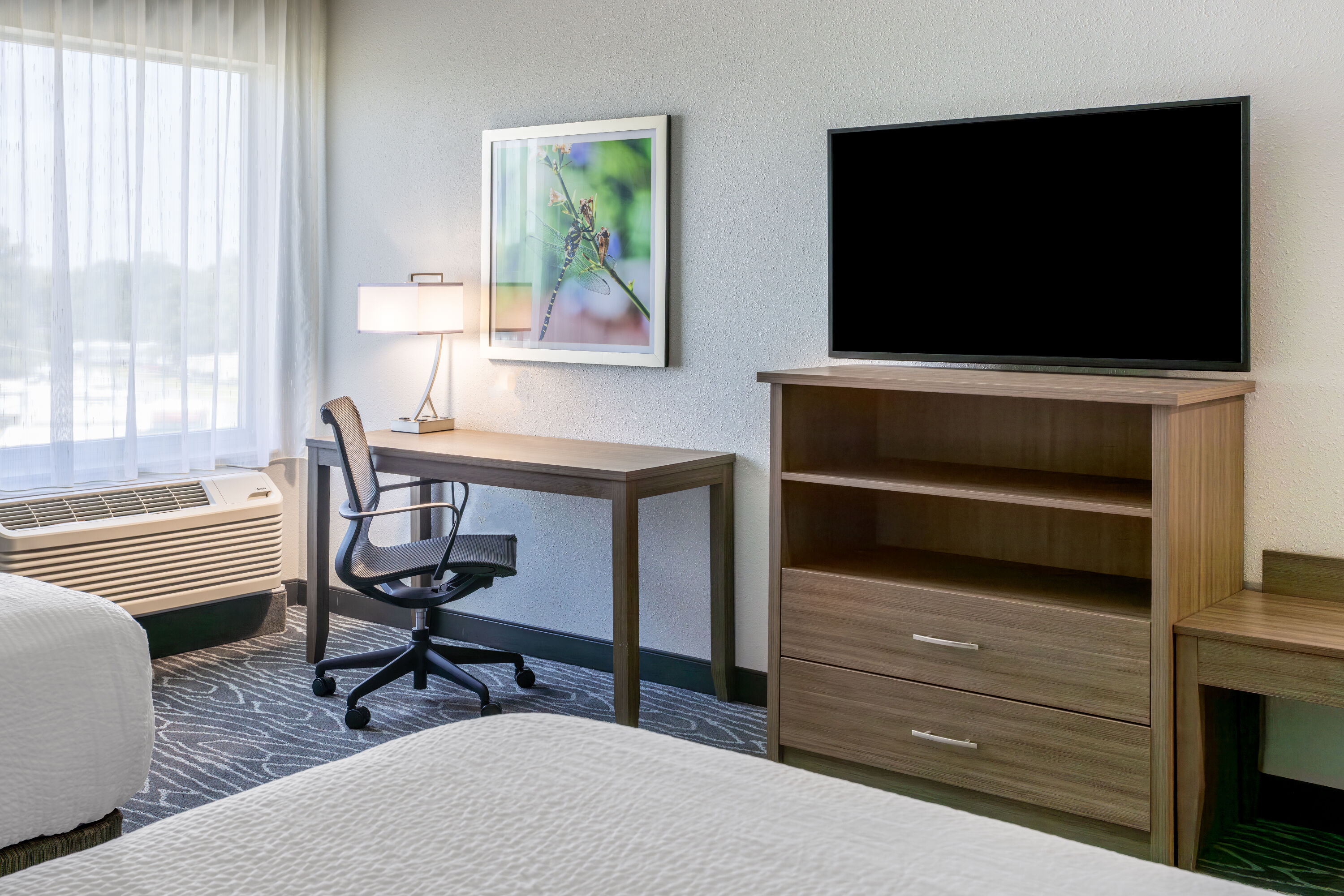 Guest room at the La Quinta Inn & Suites by Wyndham Valdosta in Valdosta, Georgia