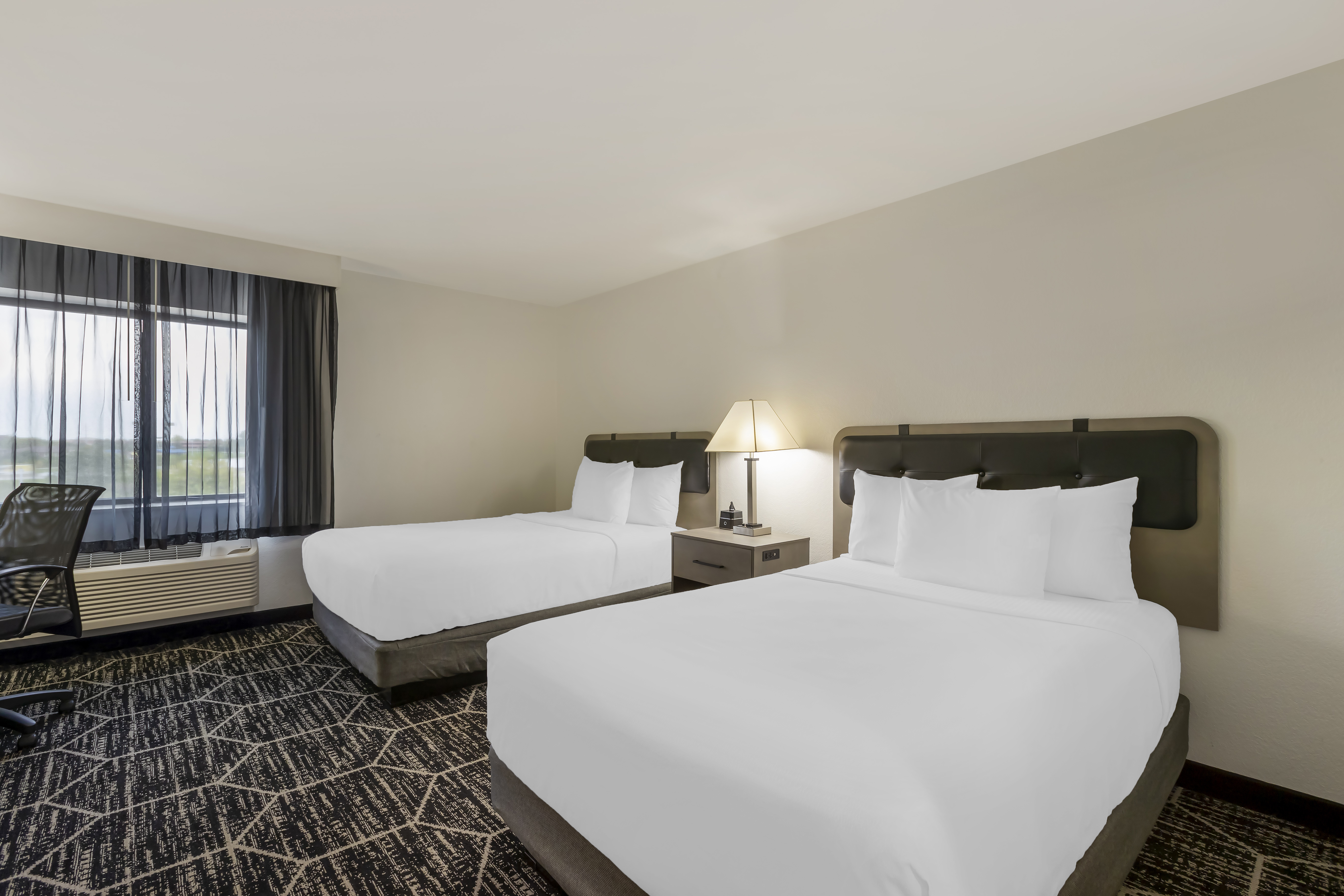 Guest room at the La Quinta Inn & Suites by Wyndham Des Moines West Clive in Clive, Iowa