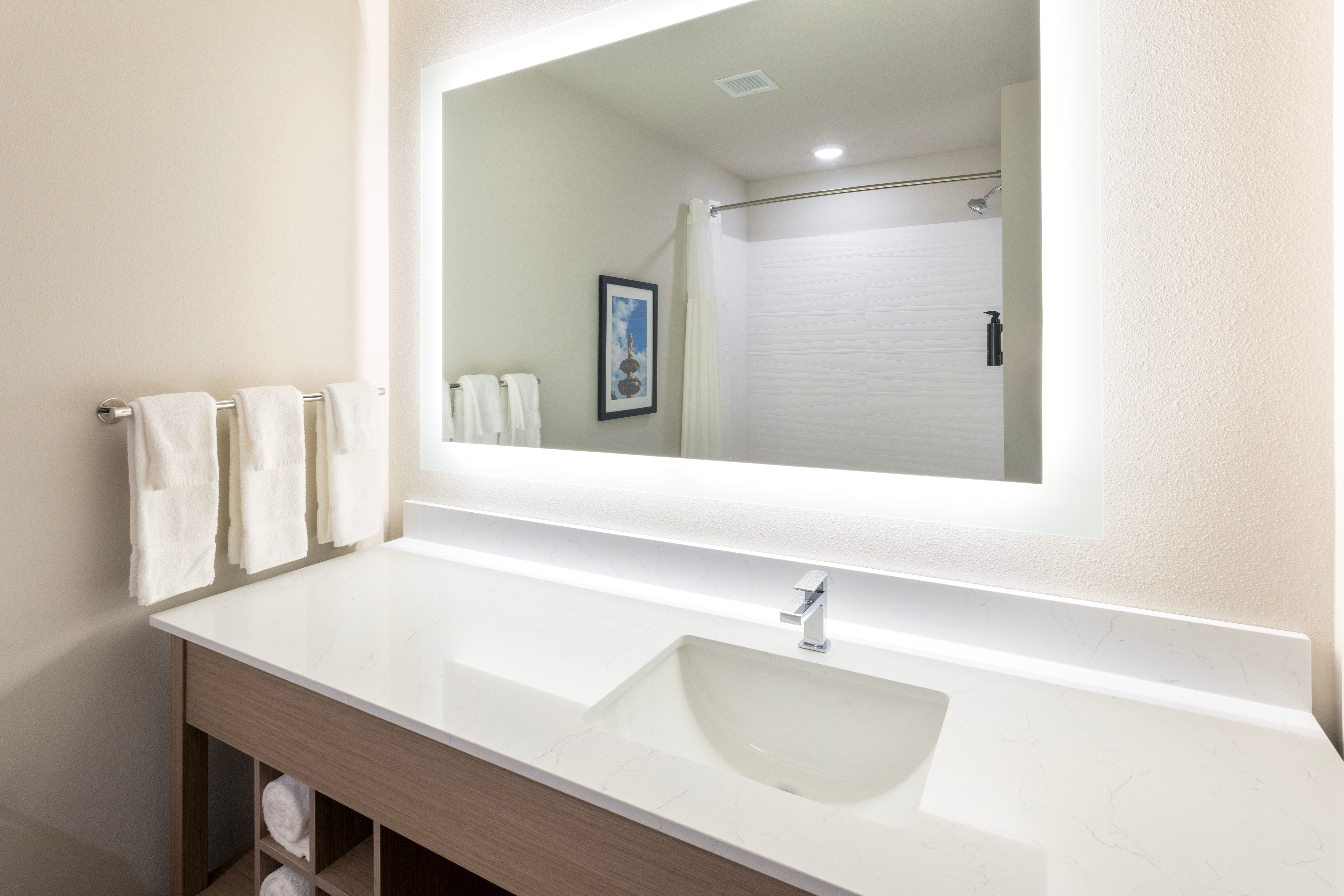 Guest room bath at the La Quinta Inn & Suites by Wyndham Johnston in Johnston, Iowa