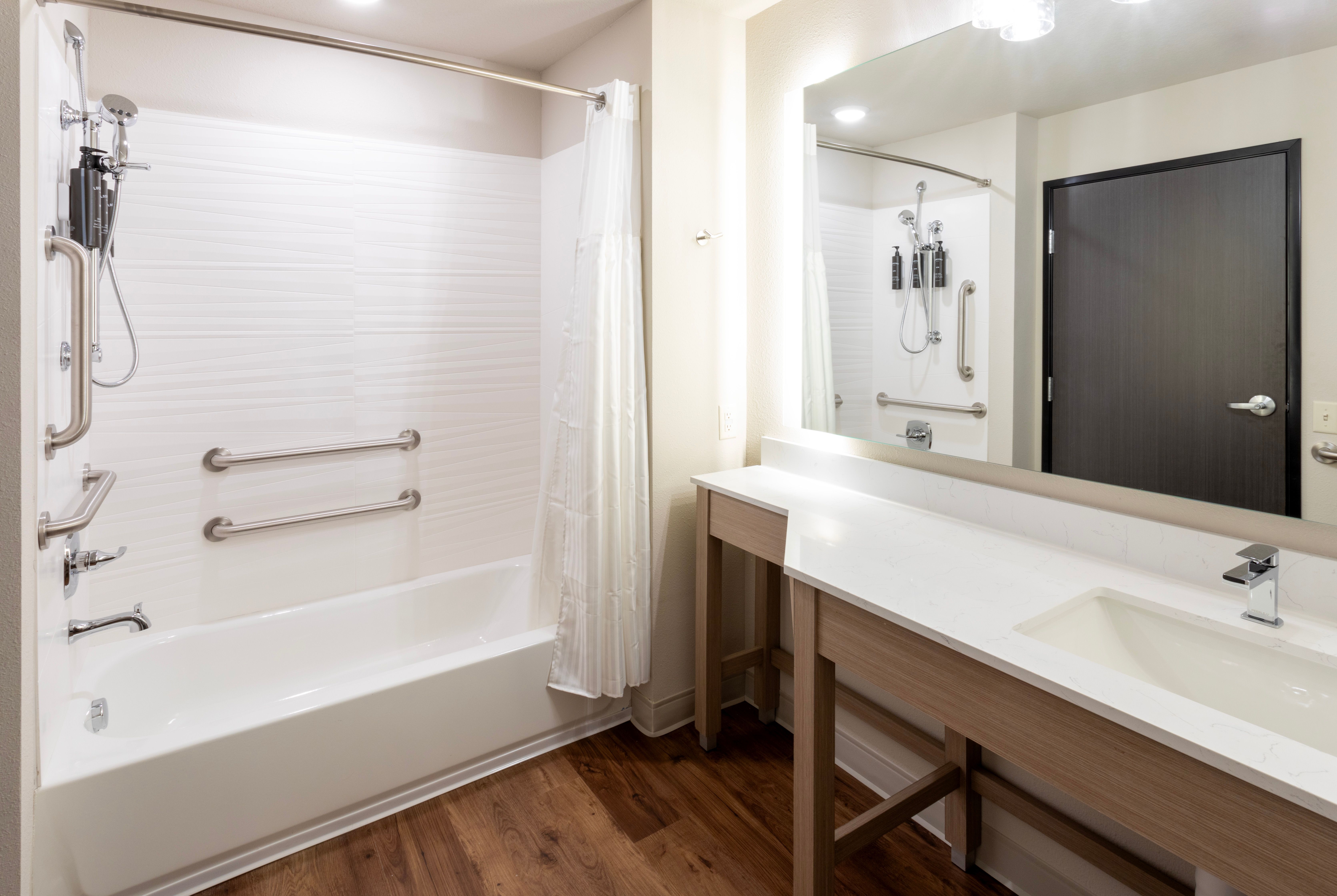 Guest room bath at the La Quinta Inn & Suites by Wyndham Johnston in Johnston, Iowa