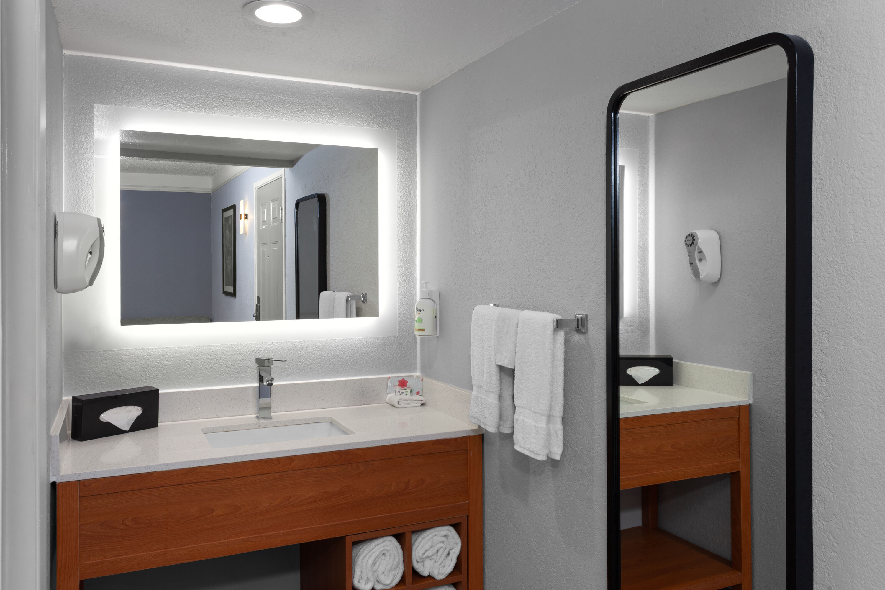 Guest room bath at the La Quinta Inn by Wyndham Champaign in Champaign, Illinois