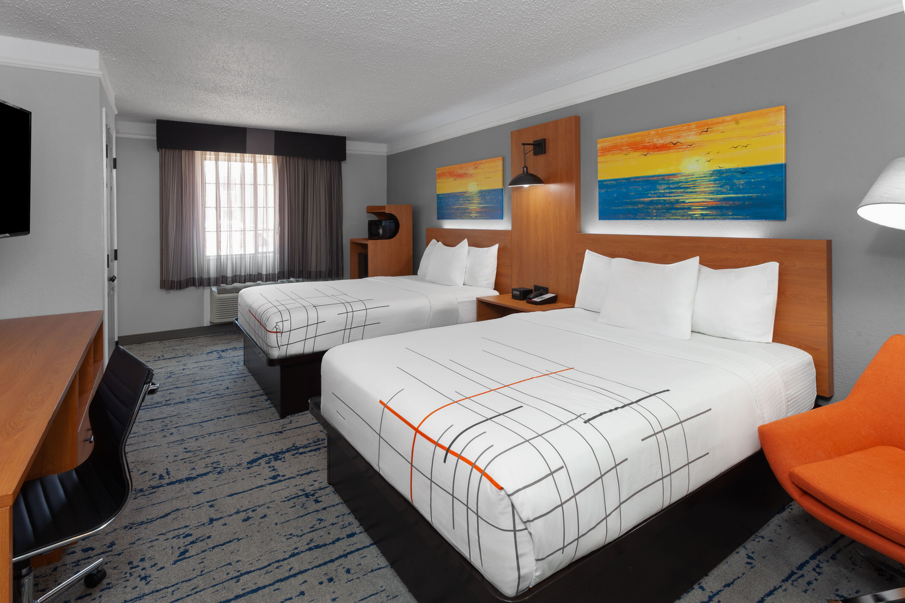 Guest room at the La Quinta Inn by Wyndham Champaign in Champaign, Illinois