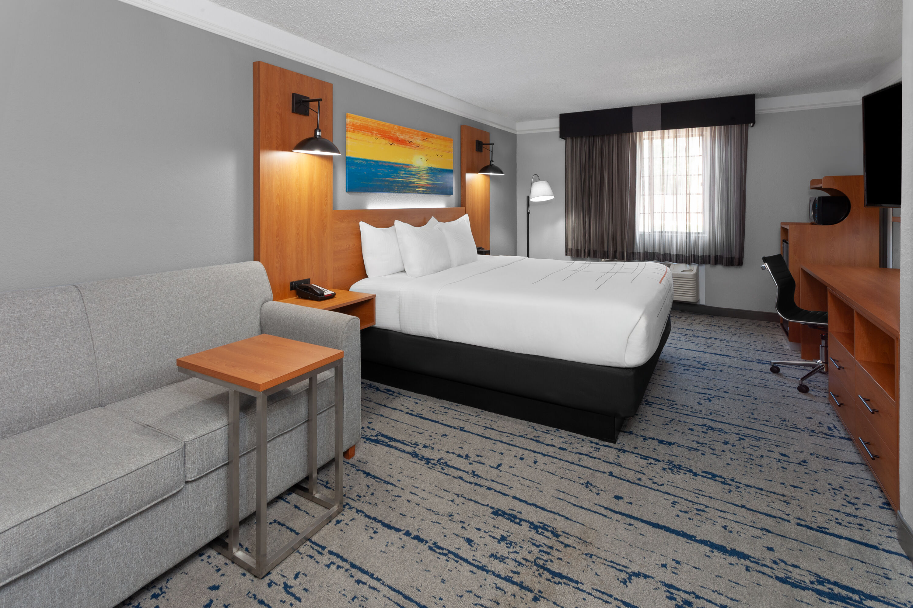 Guest room at the La Quinta Inn by Wyndham Champaign in Champaign, Illinois