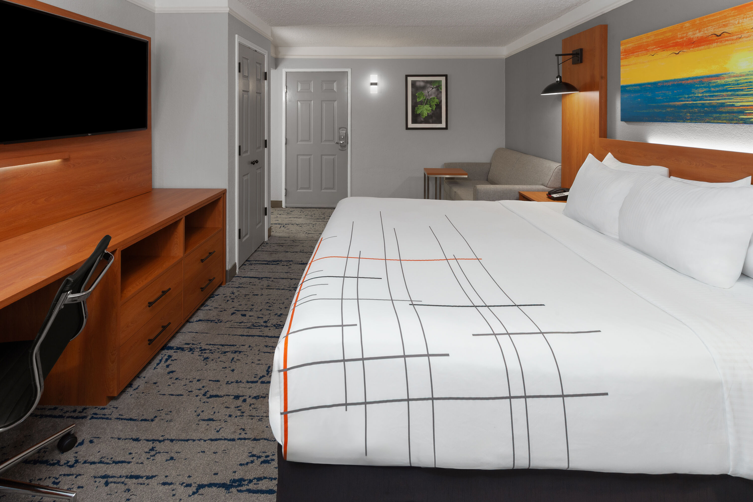 Guest room at the La Quinta Inn by Wyndham Champaign in Champaign, Illinois