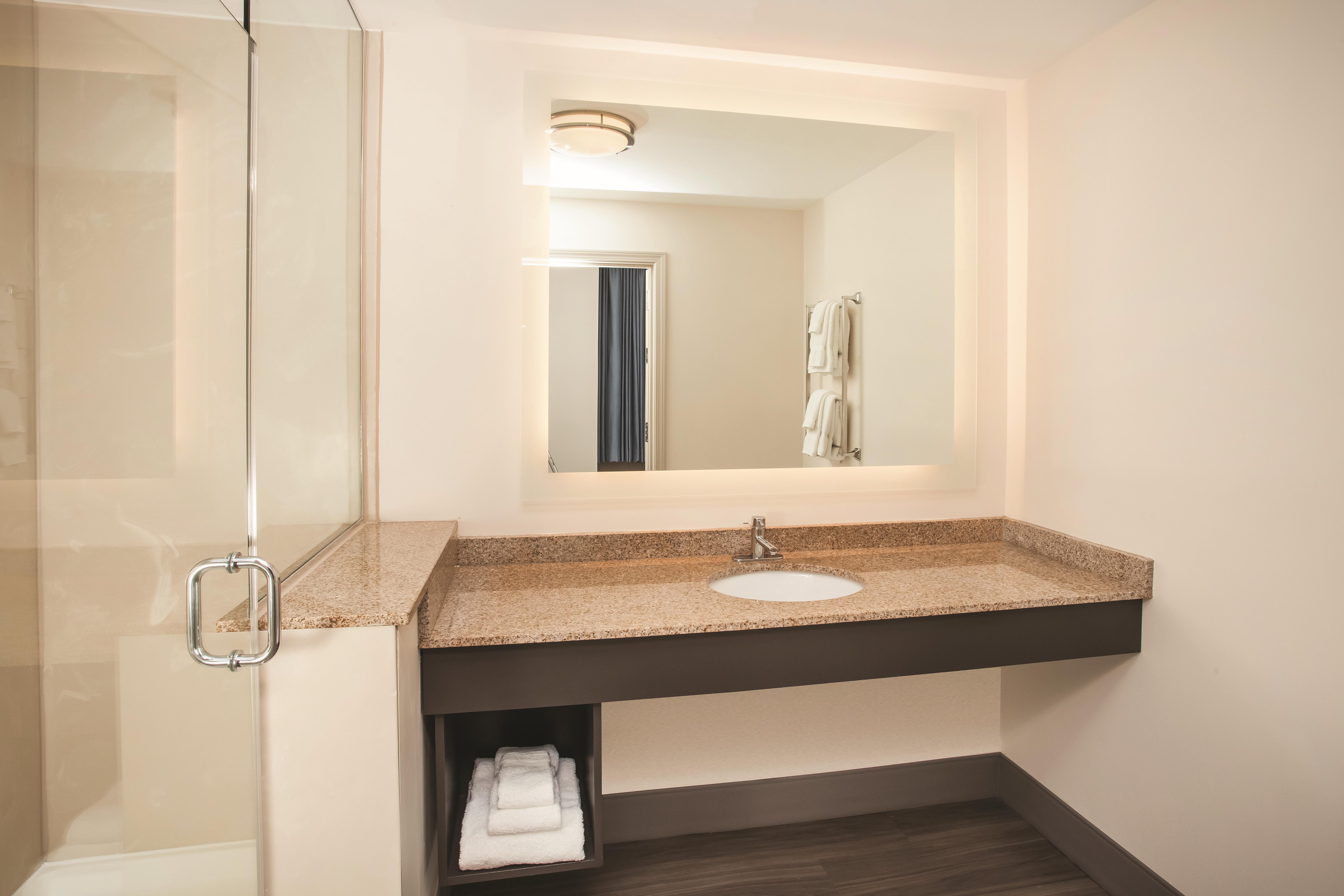 Guest room bath at the La Quinta Inn & Suites by Wyndham Chicago Downtown in Chicago, Illinois