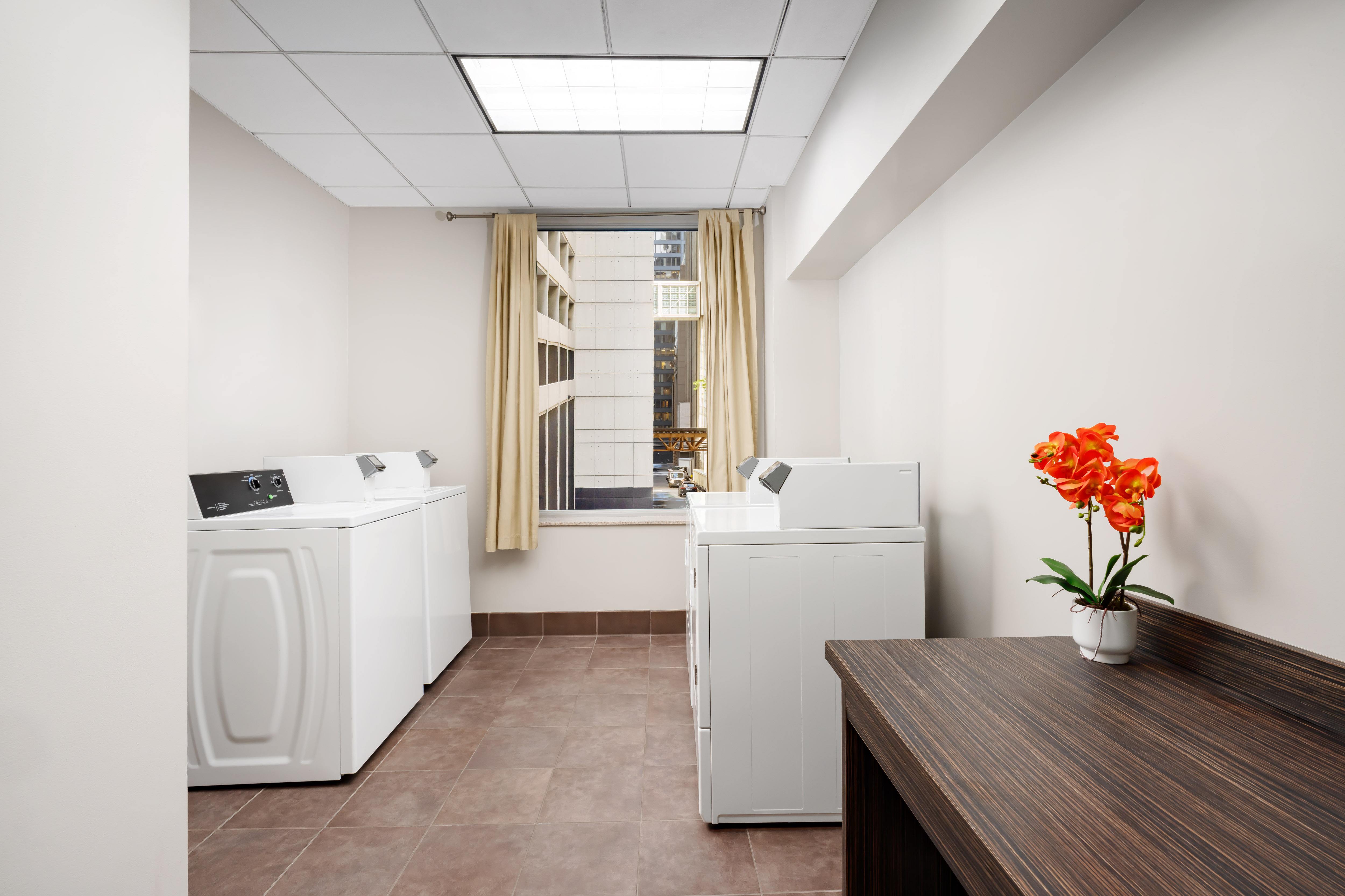 Laundry facilities at La Quinta Inn & Suites by Wyndham Chicago Downtown in Chicago, Illinois