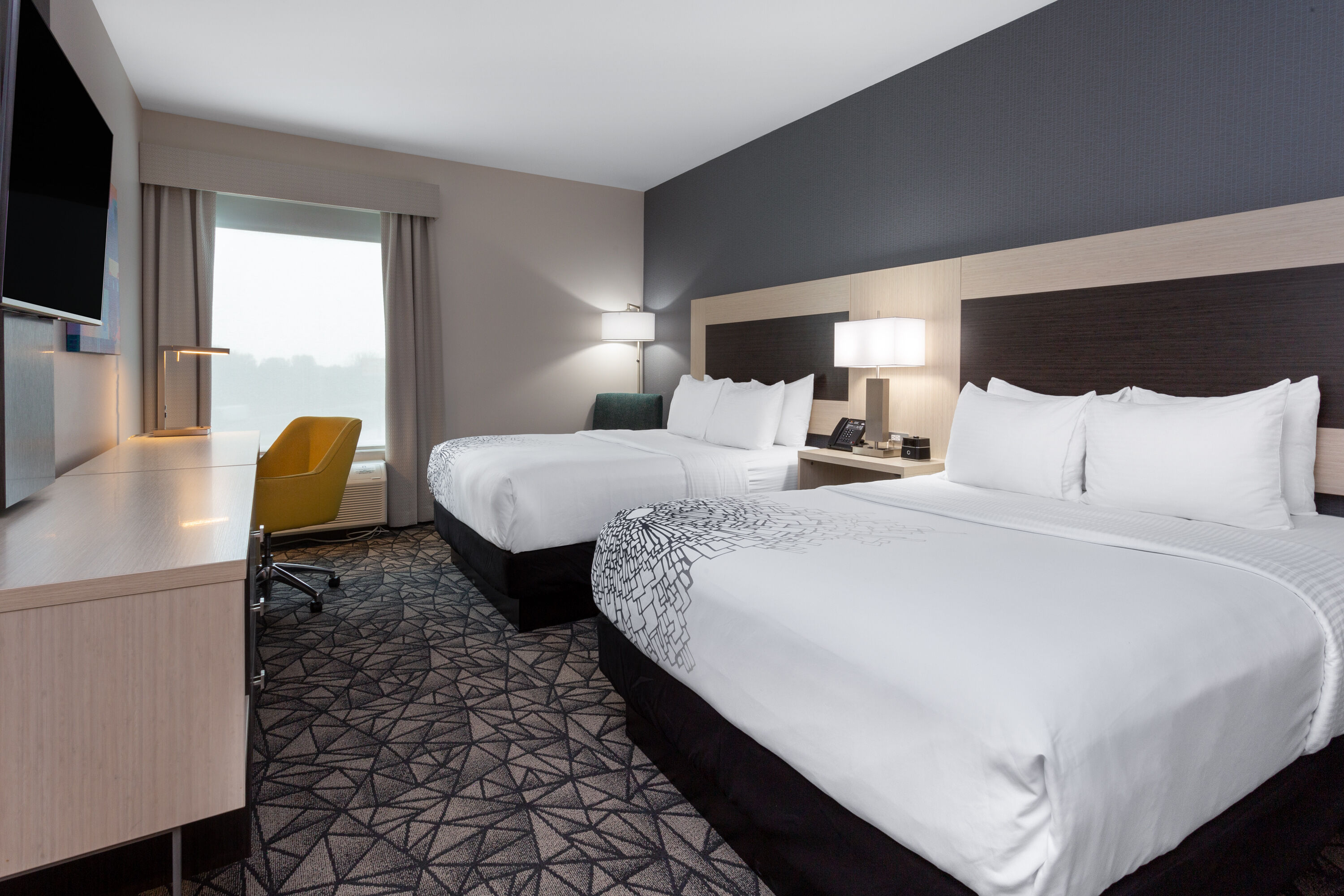 Guest room at the La Quinta Inn & Suites by Wyndham Shorewood in Shorewood, Illinois