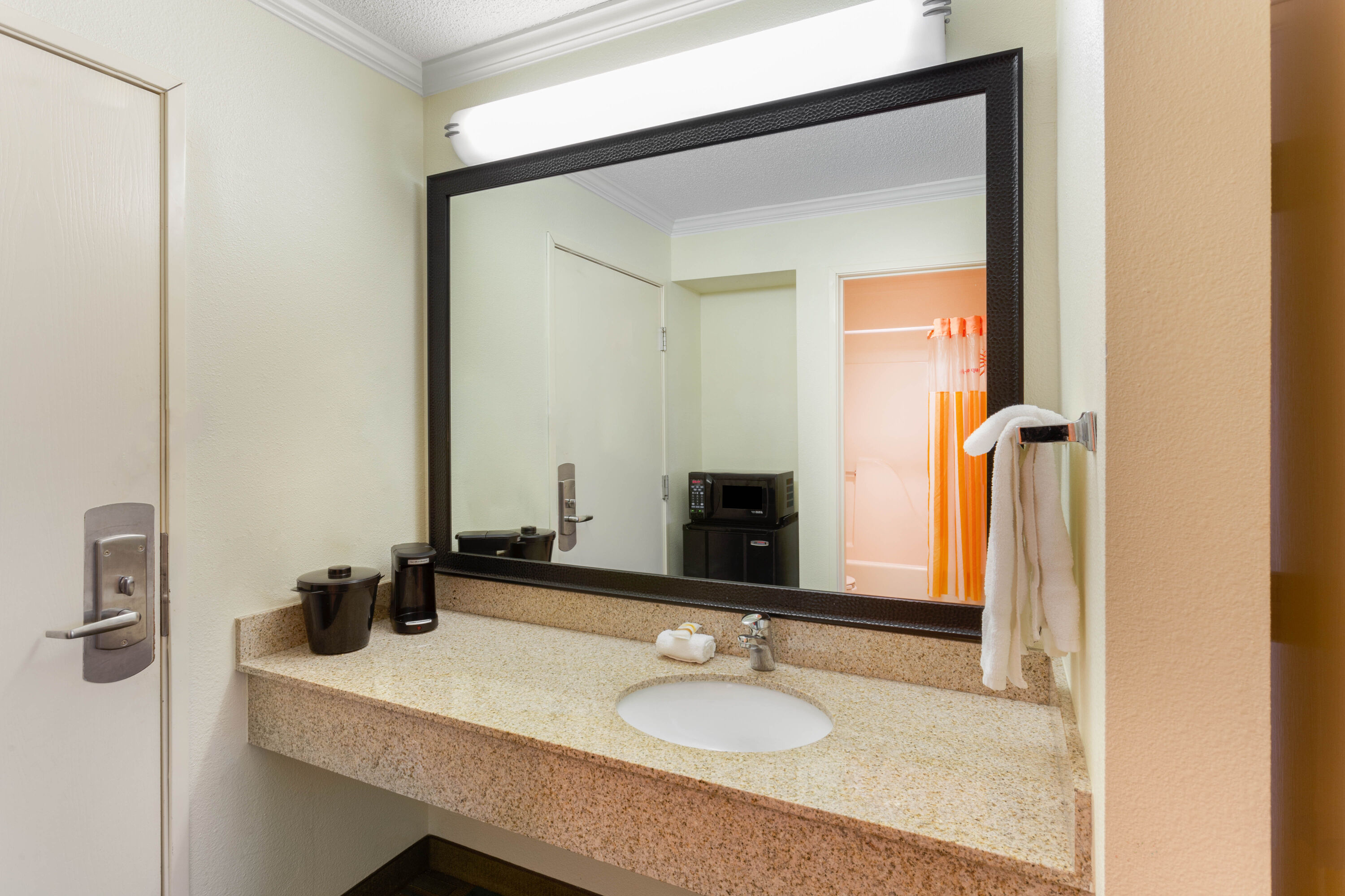 Guest room bath at the La Quinta Inn by Wyndham Chicago Willowbrook in Willowbrook, Illinois