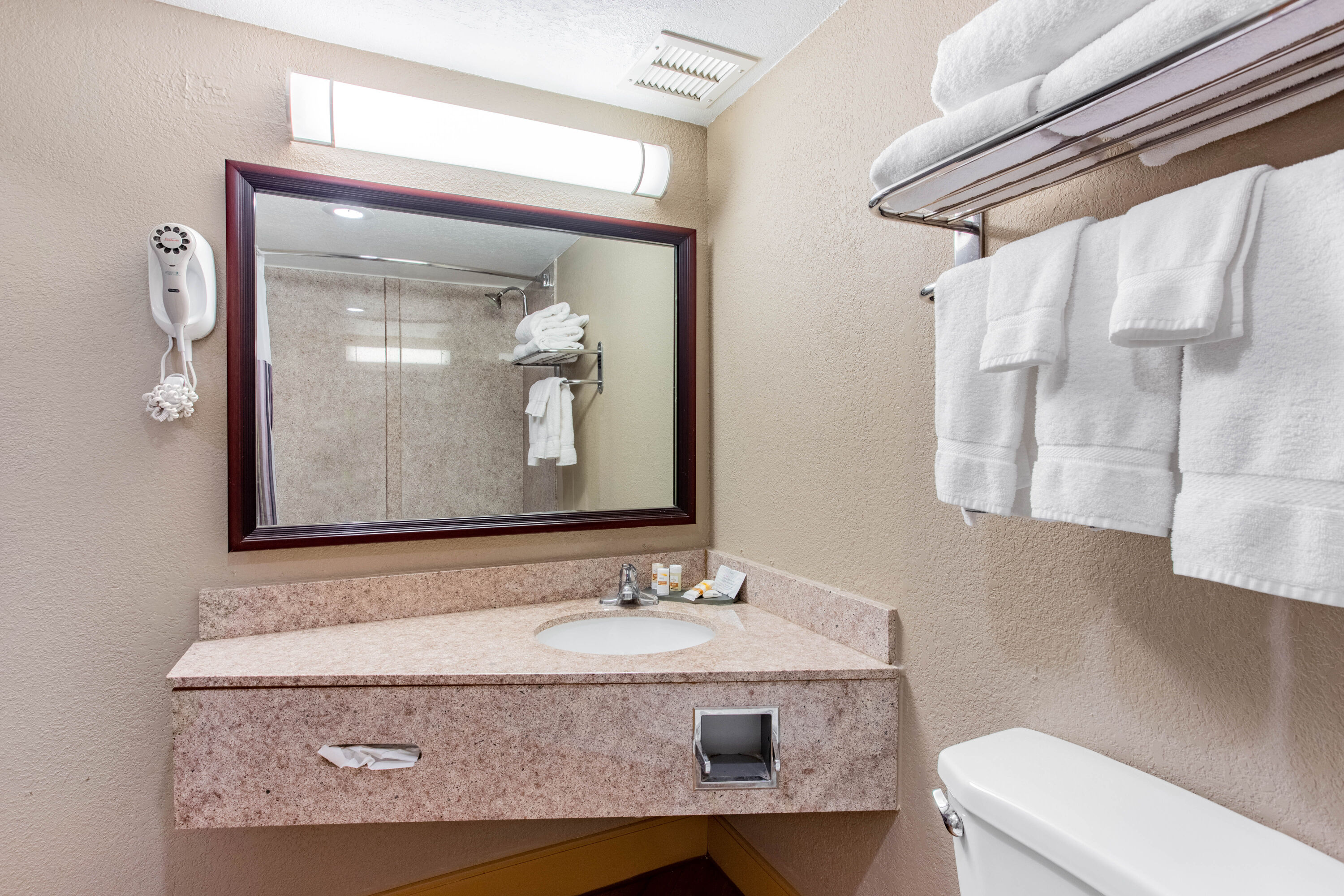Guest room bath at the La Quinta Inn & Suites by Wyndham Indianapolis South in Indianapolis, Indiana