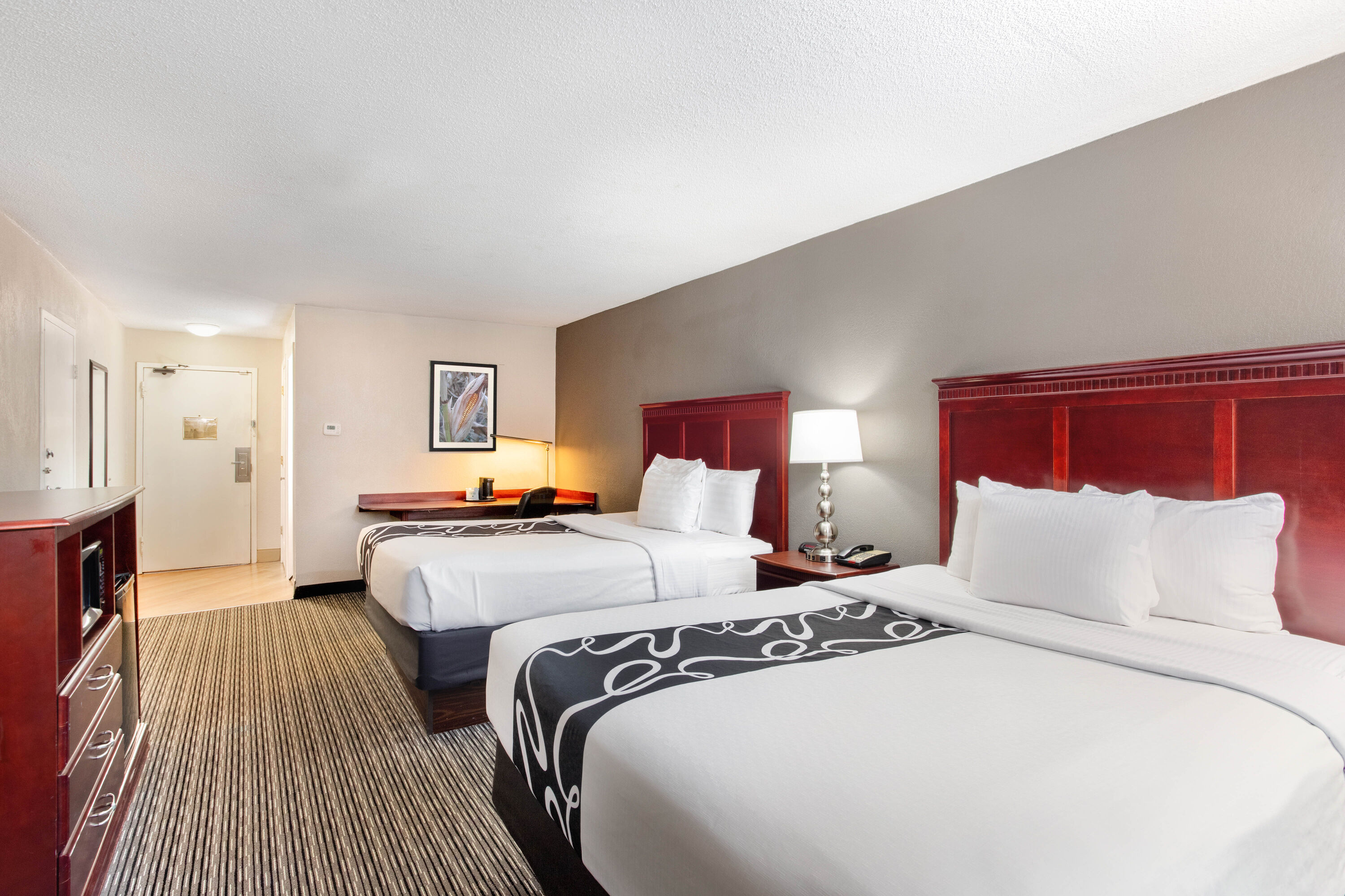 Guest room at the La Quinta Inn & Suites by Wyndham Indianapolis South in Indianapolis, Indiana