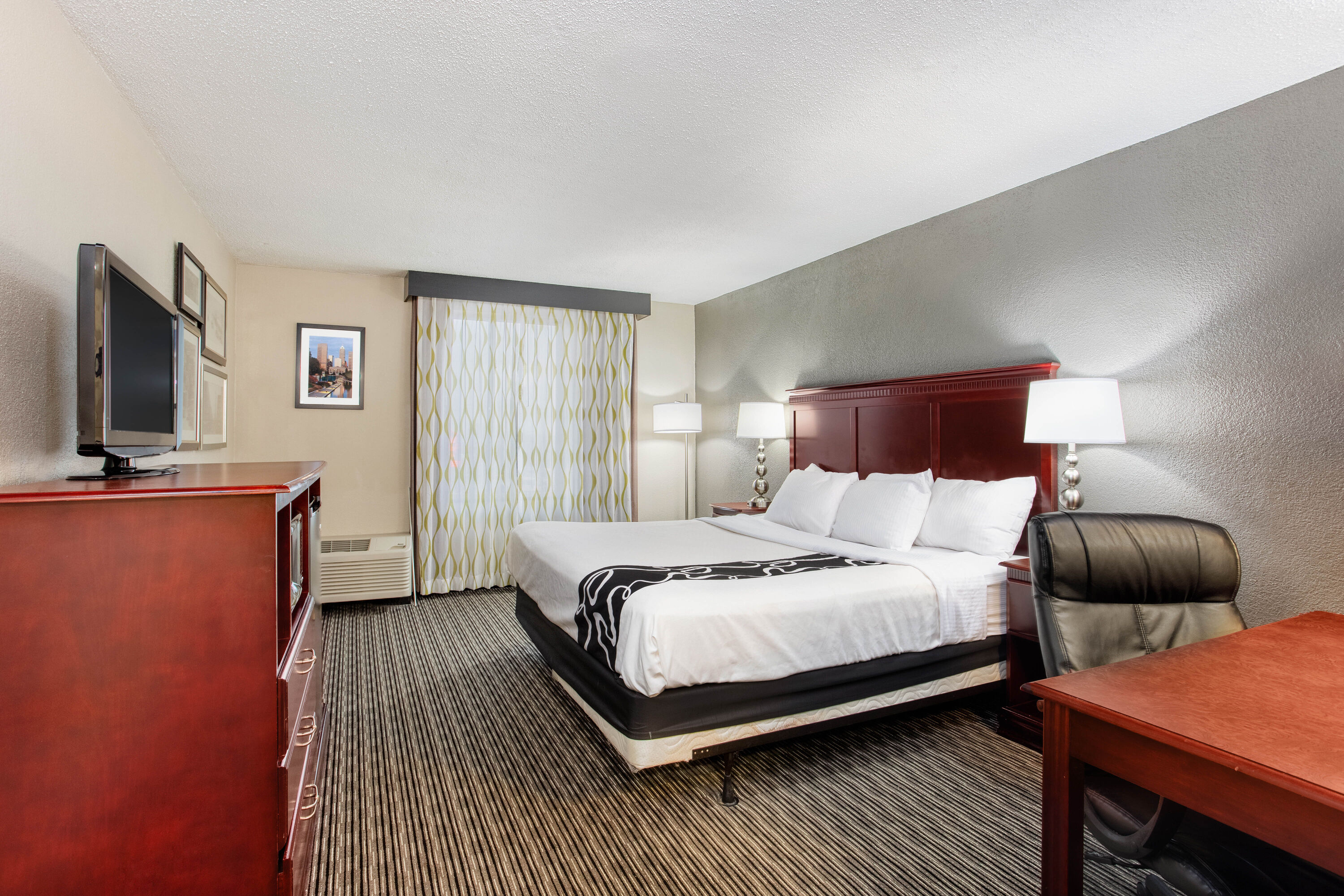 Guest room at the La Quinta Inn & Suites by Wyndham Indianapolis South in Indianapolis, Indiana