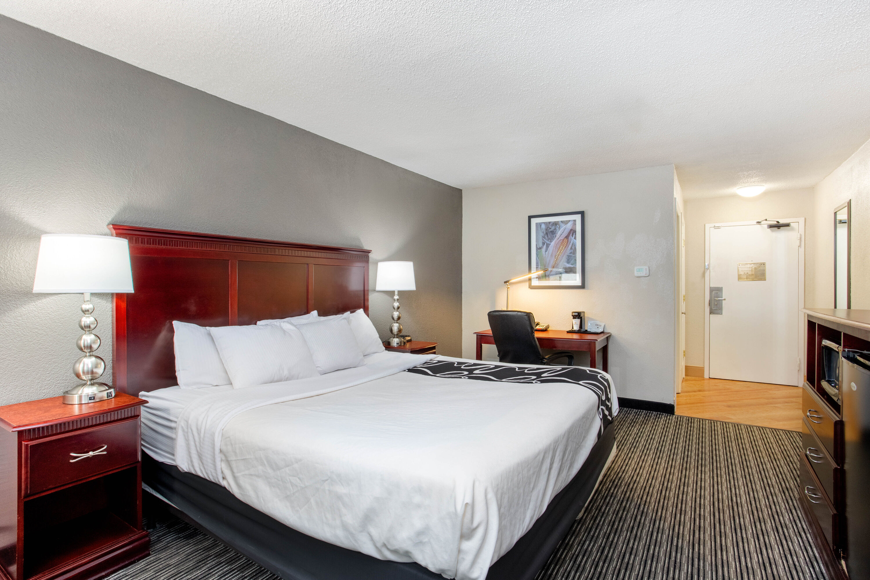 Guest room at the La Quinta Inn & Suites by Wyndham Indianapolis South in Indianapolis, Indiana