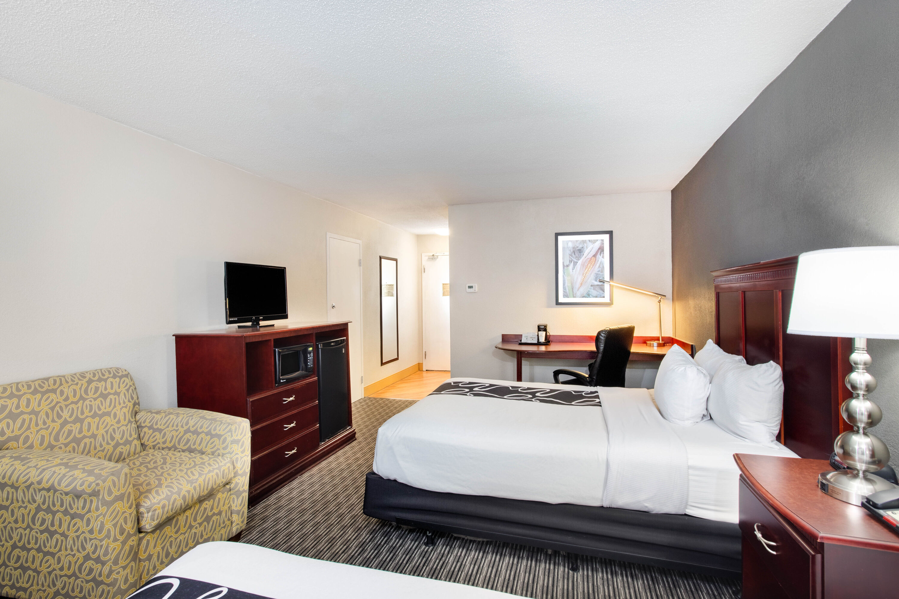 Guest room at the La Quinta Inn & Suites by Wyndham Indianapolis South in Indianapolis, Indiana